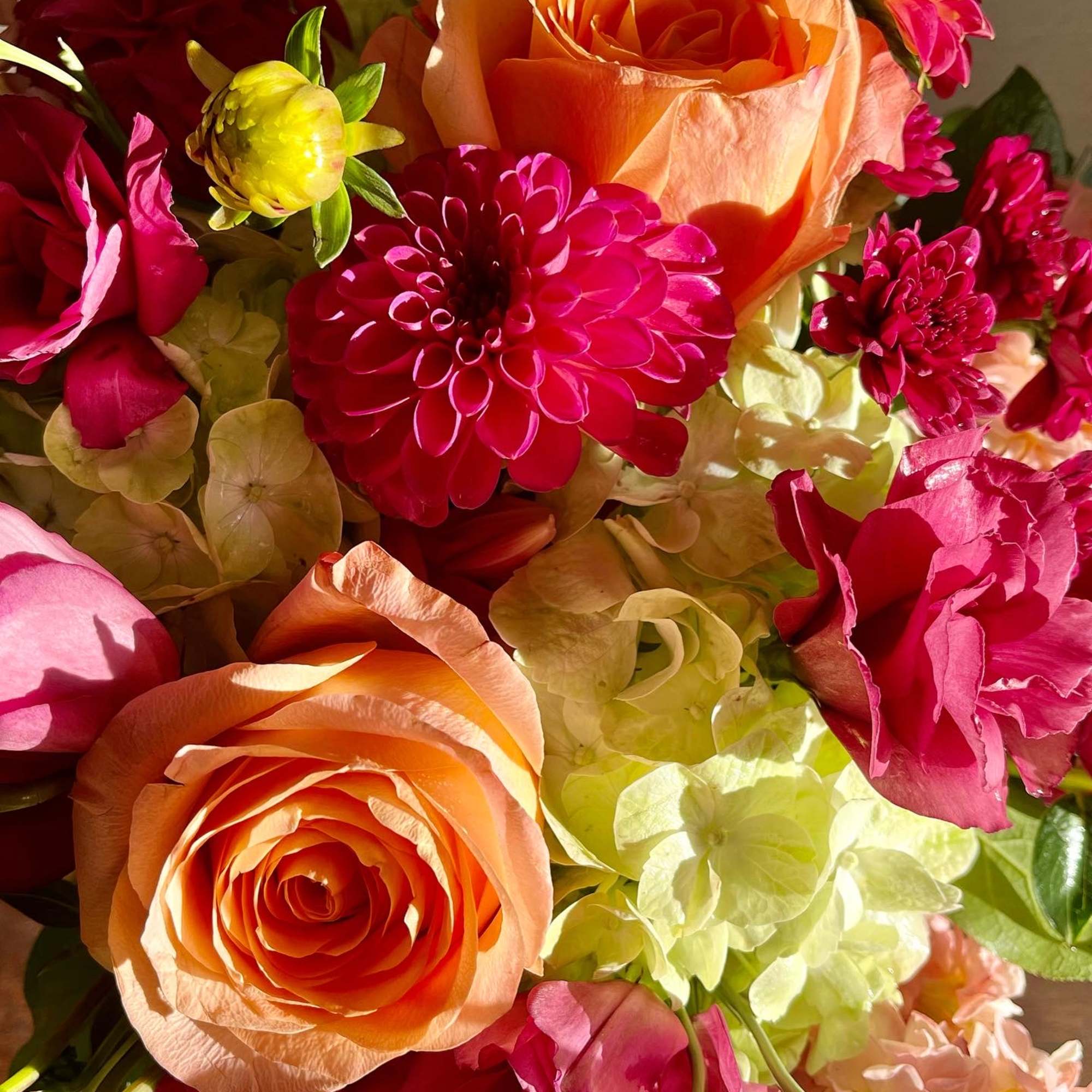 This arrangement includes Seasonal Pink Dahlias, Beautiful Magenta Lisianthus, Green Hydrangeas, Pale, photo 3 of 3
