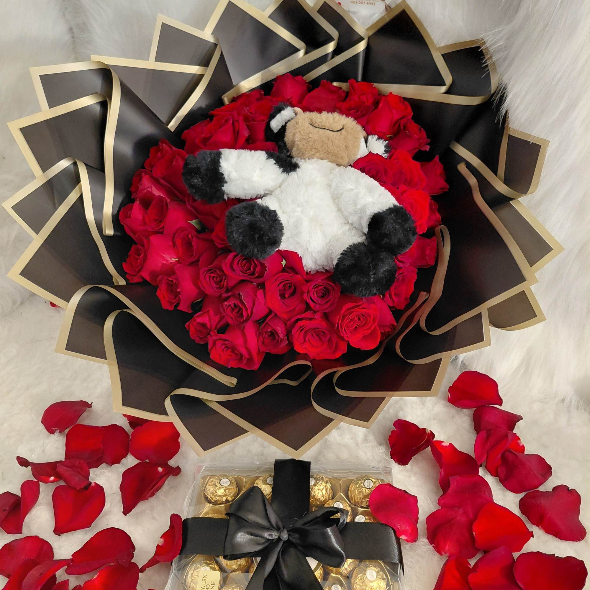 A beautiful bouquet of cow-shaped chocolates, perfect for winning someone's heart., photo 2 of 2