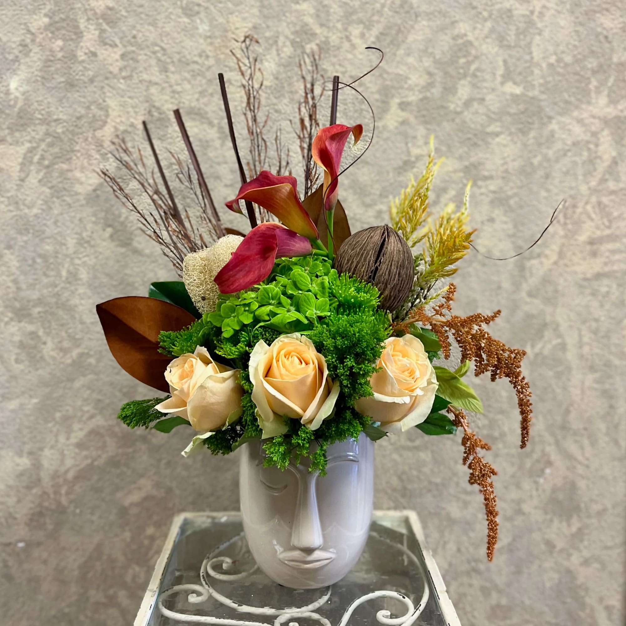 Type of Flowers: Calla Lilies, Hydrangeas, Roses, Branches, Sorghum, and more in