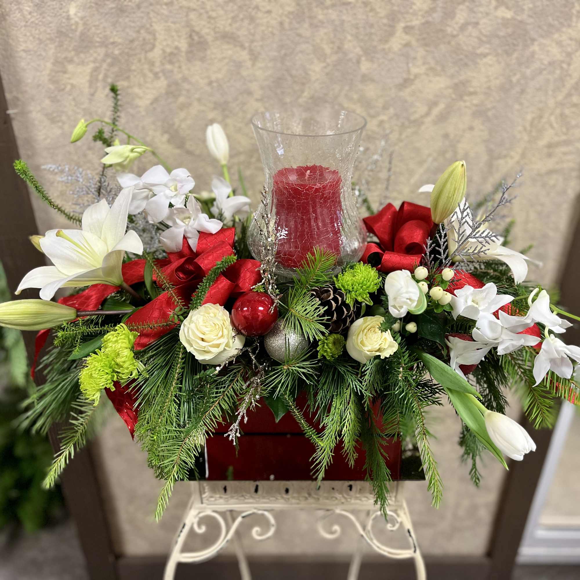 Type of Flowers: White Lilies, Orchids, Roses, Tulips, Green Buttons with a