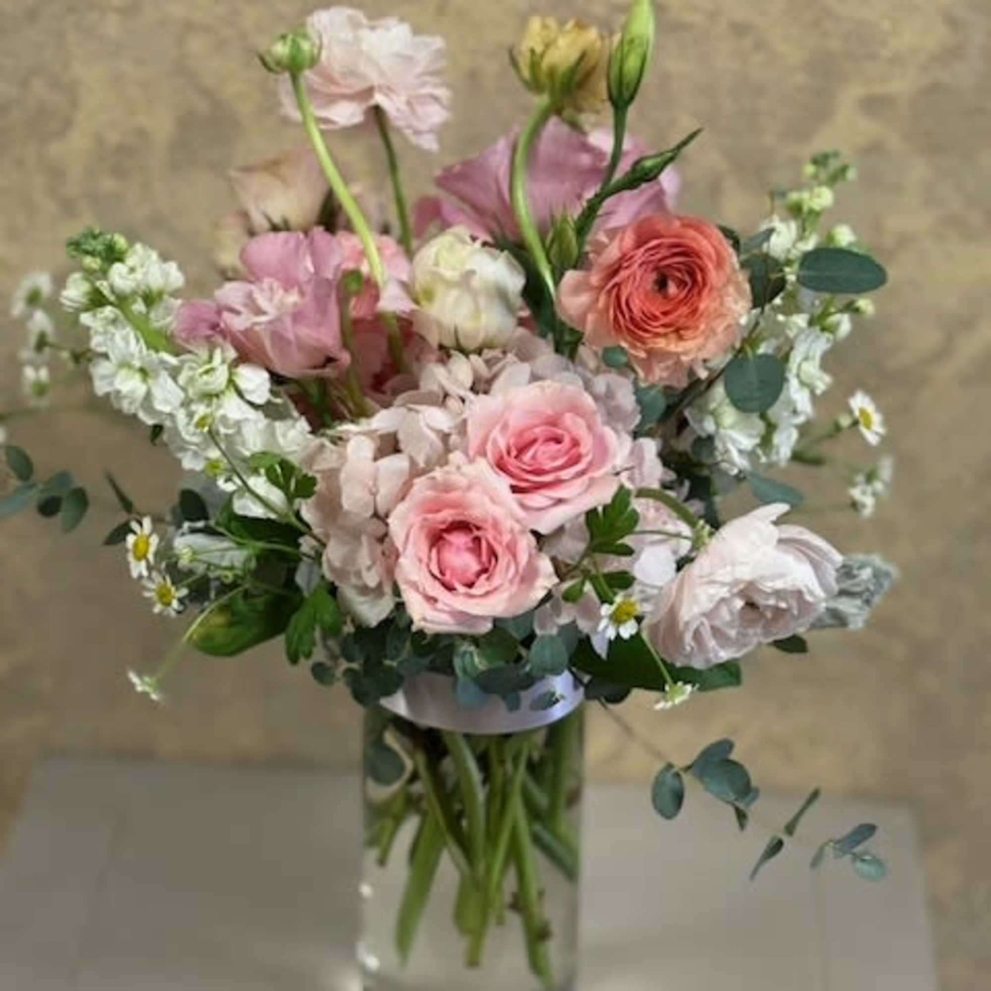 Recipe: Seasonal Ranunculus, Spray Roses, Stock, Hydrangae, Lisnathus, Camomille, and Eucalyptus in
