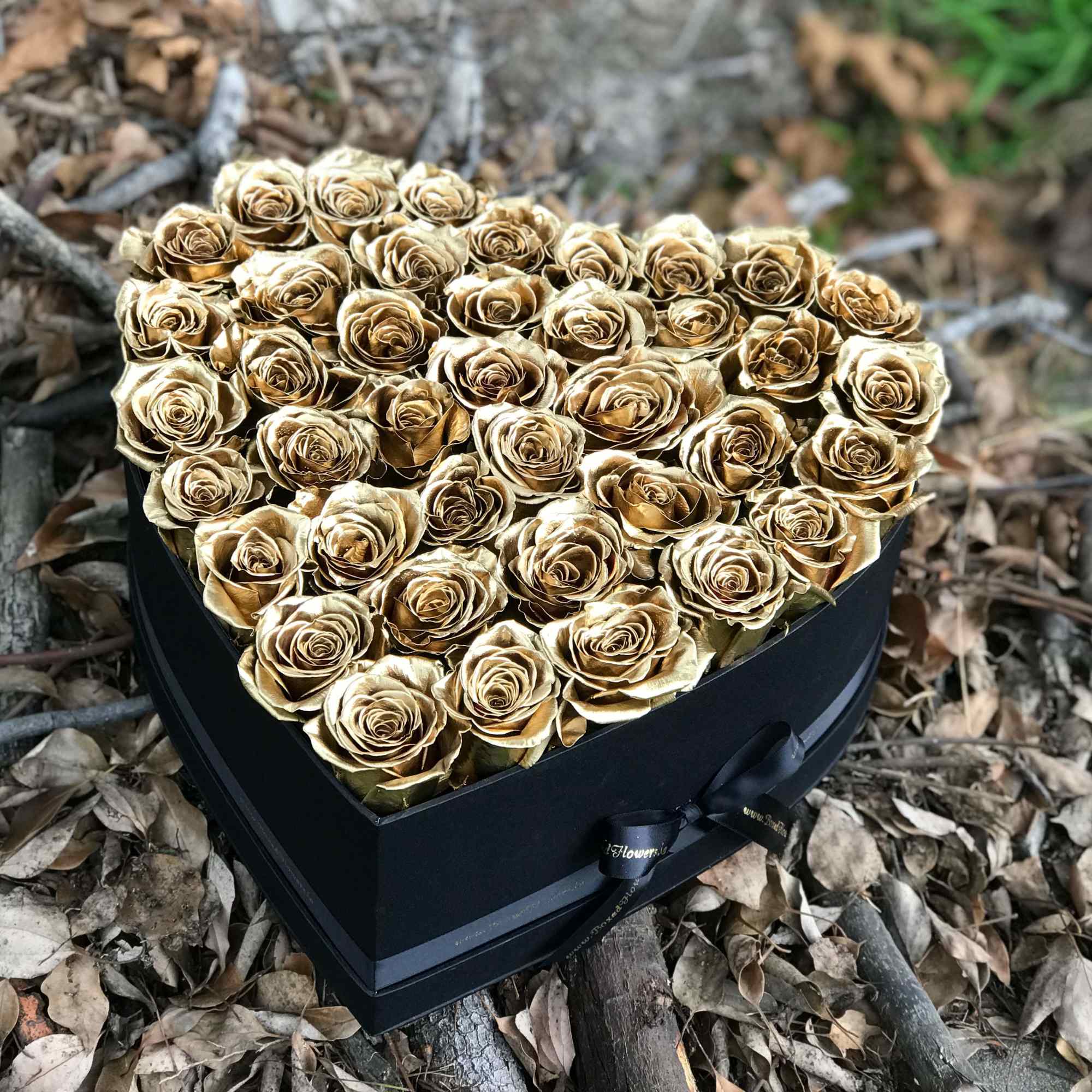 Satin black box filled with 50 gold roses. , photo 2 of 3