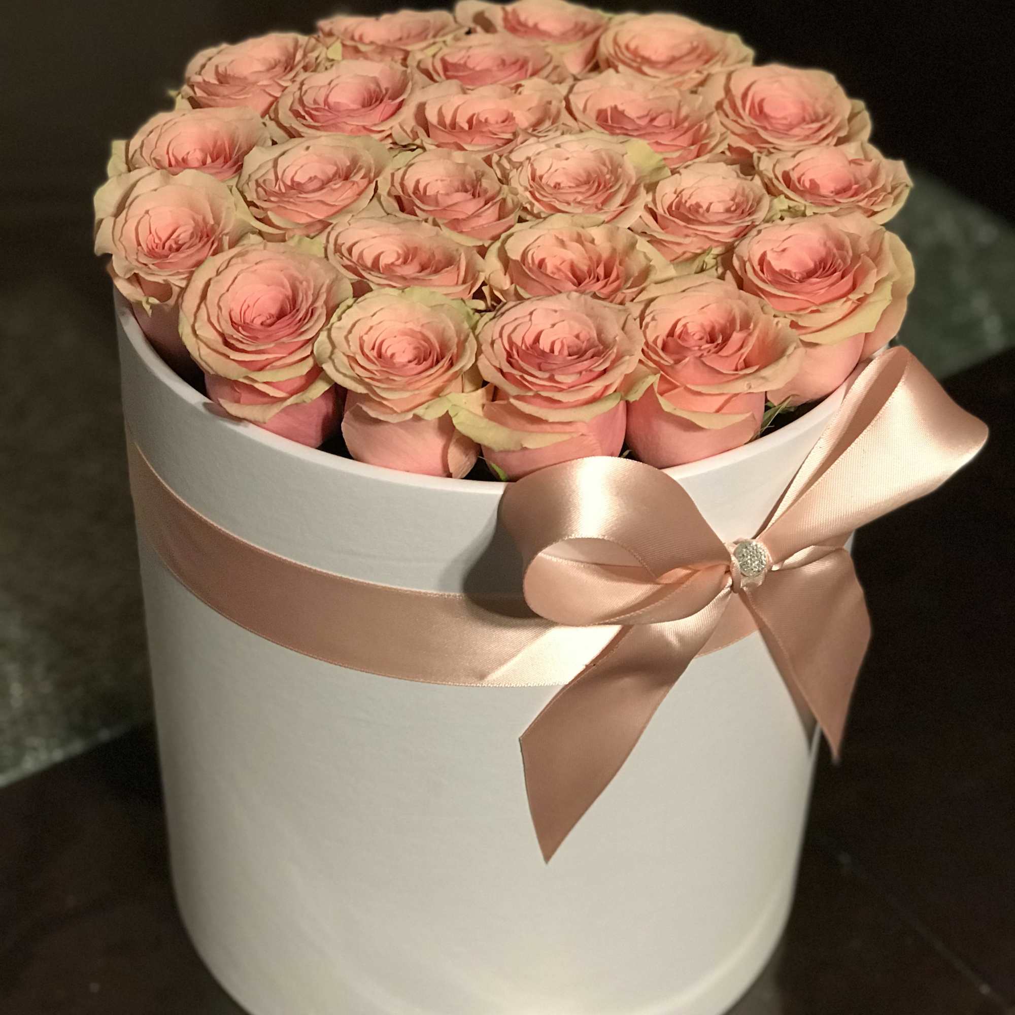 This is a 13 inch tall box filled with 25 gorgeous roses