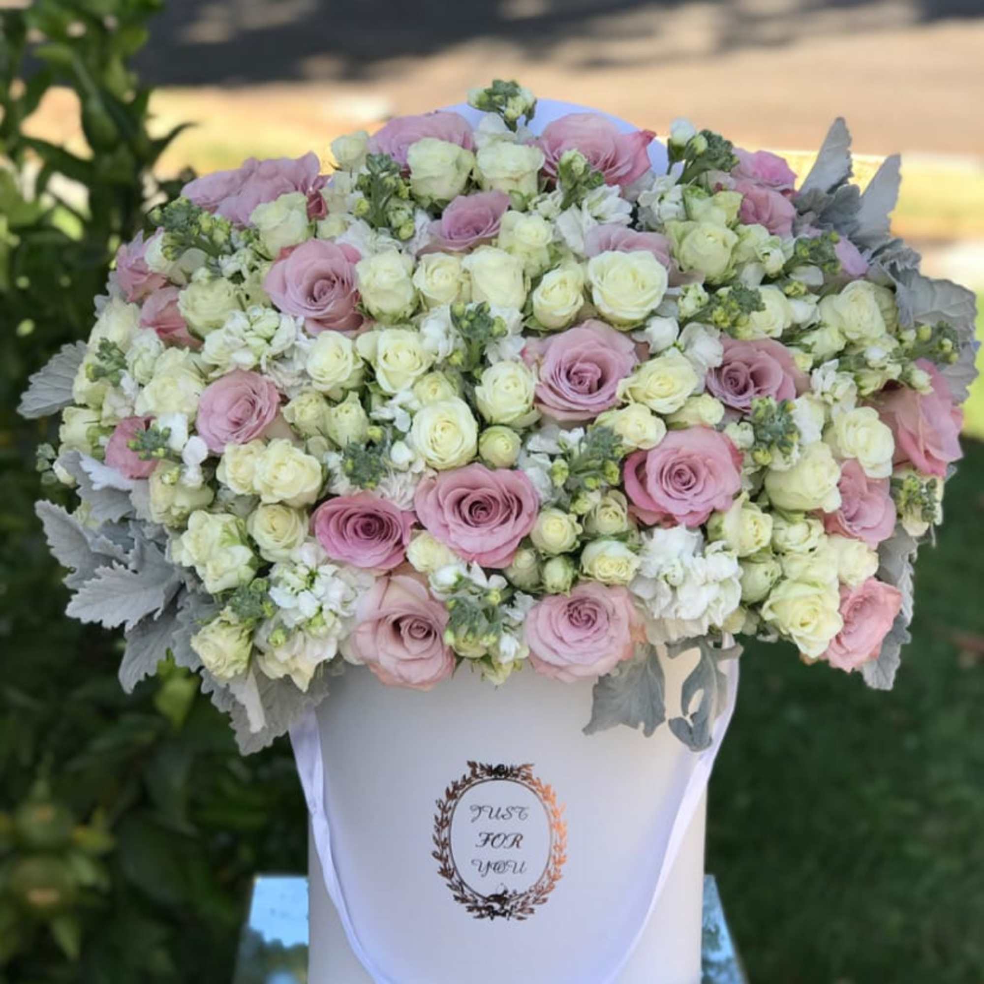 This is a stunning white box filled with Faith roses and white, photo 3 of 3