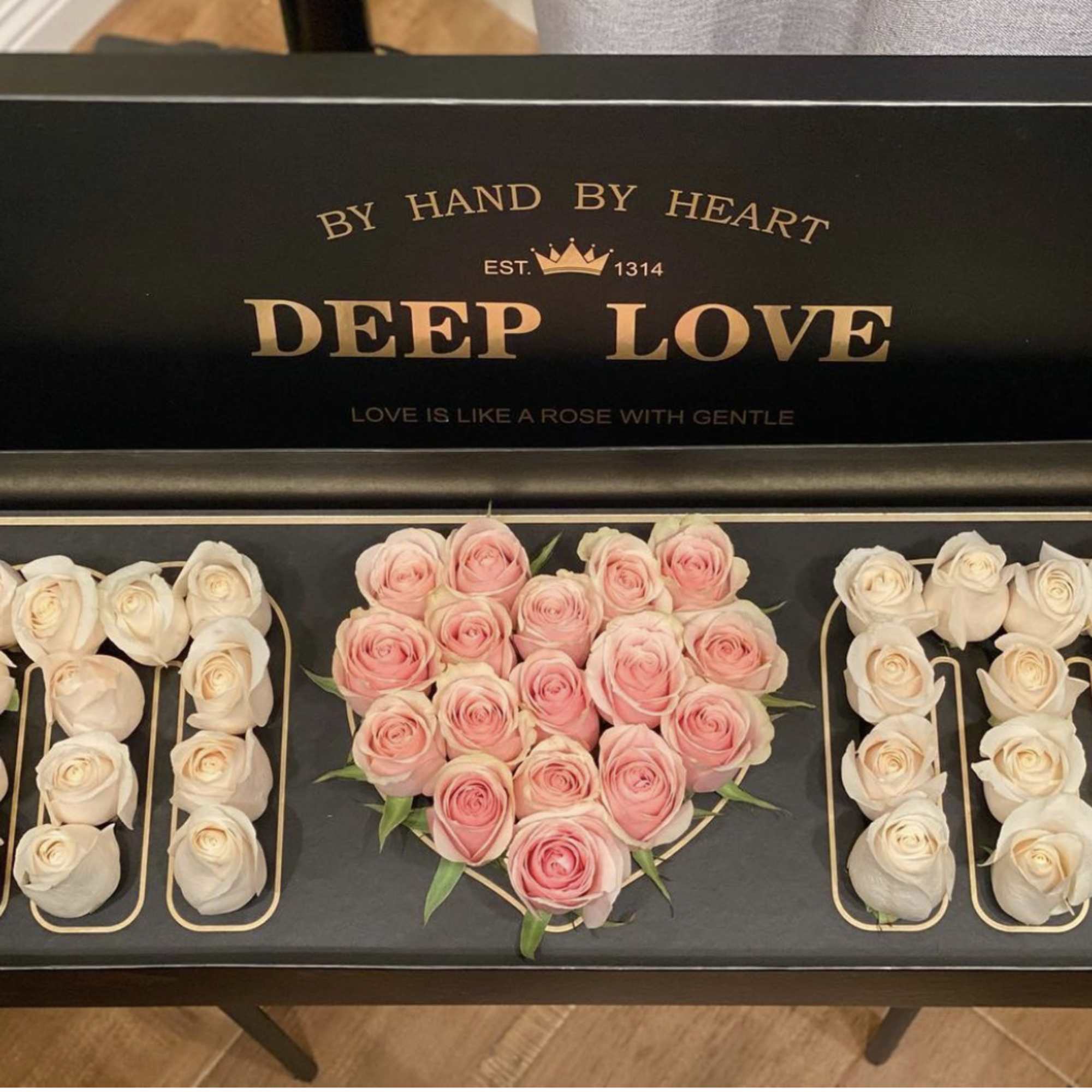 Heart-shaped rose box with pink and white roses