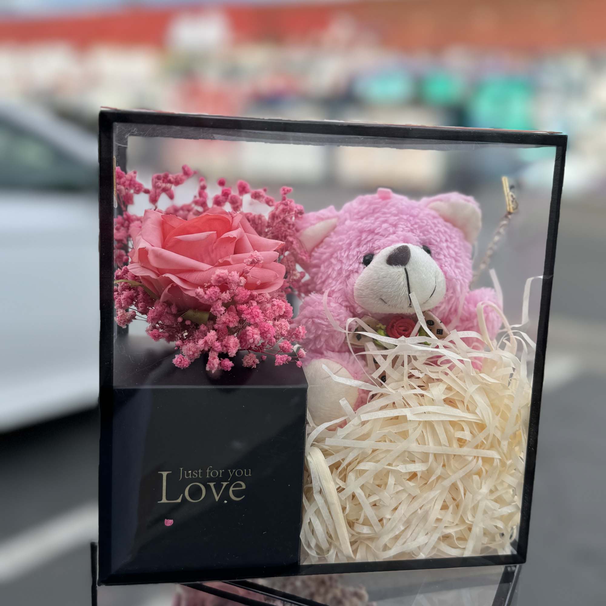 Pink rose and teddy bear gift box with shredded filler