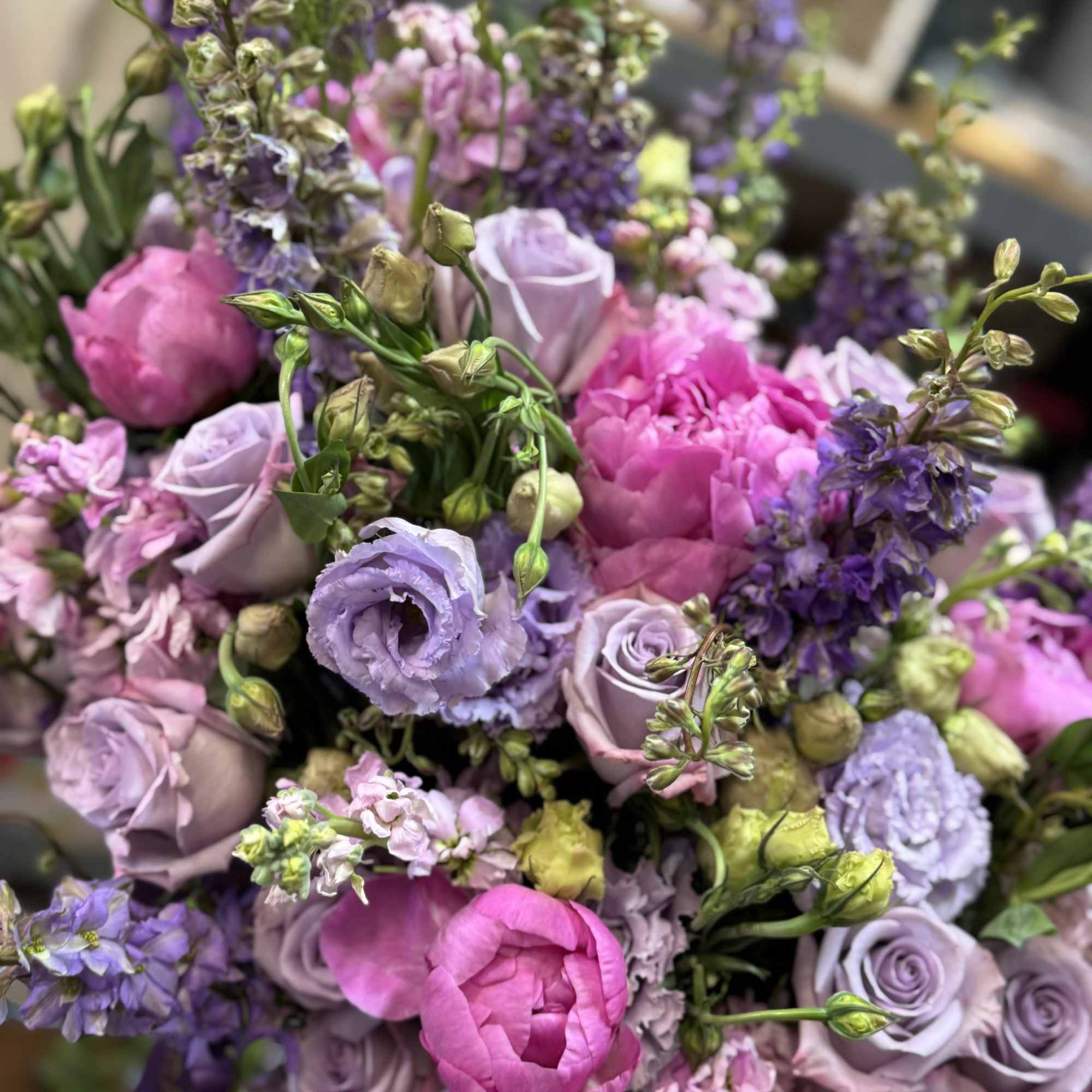 Bouquet of lavender and pink flowers with purple spikes