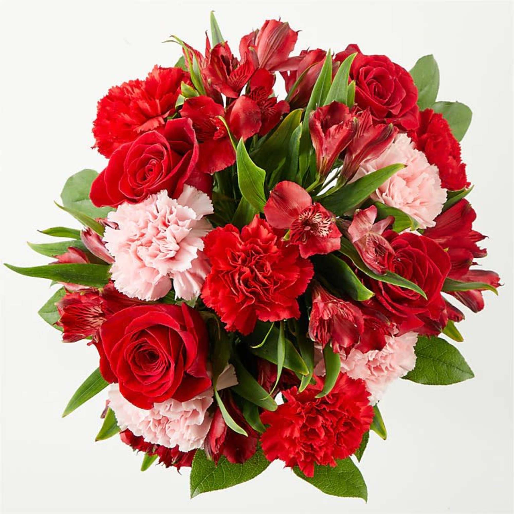 Red roses and carnations with pink alstroemeria in a bouquet