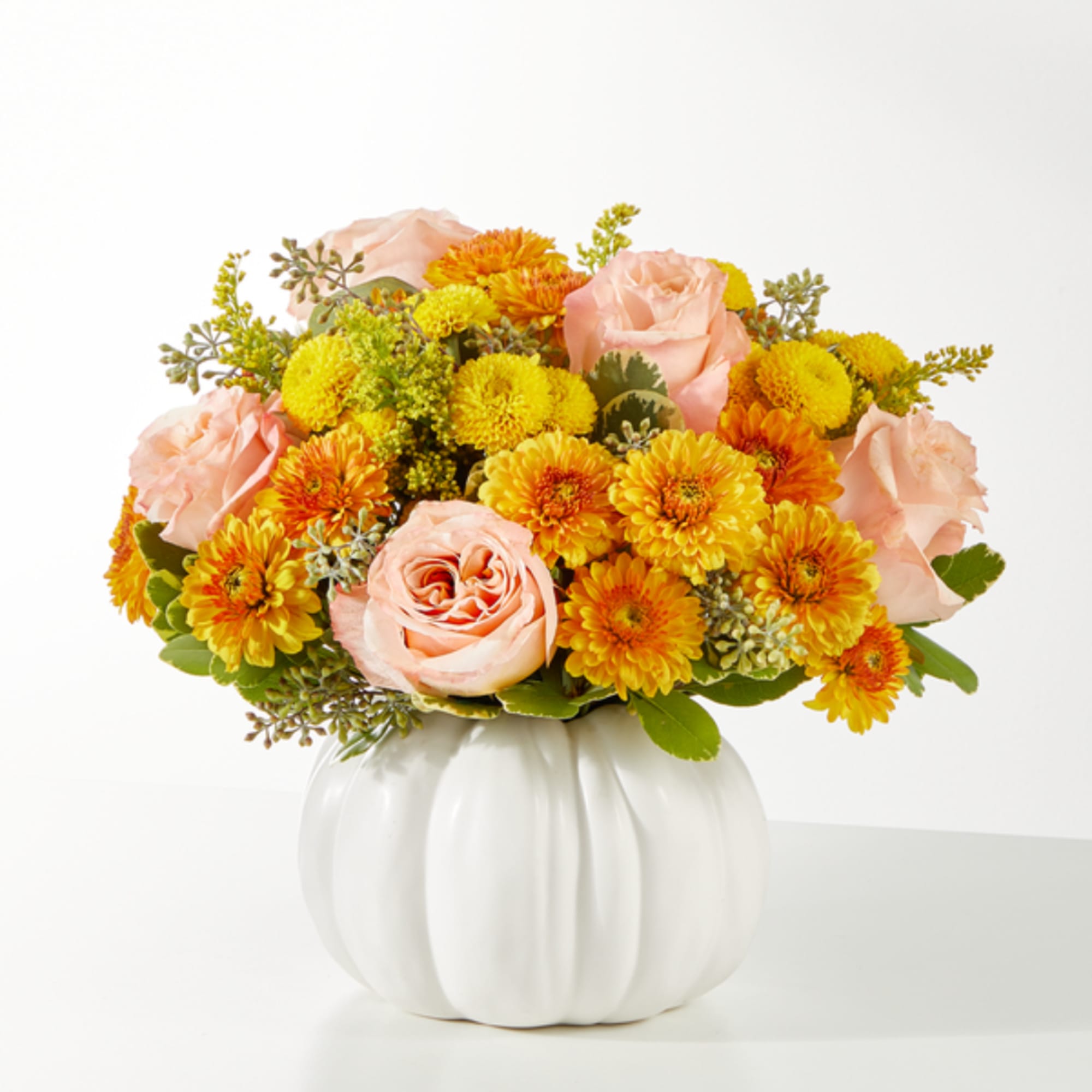 Peach roses and yellow-orange mums in a white pumpkin vase, photo 4 of 4