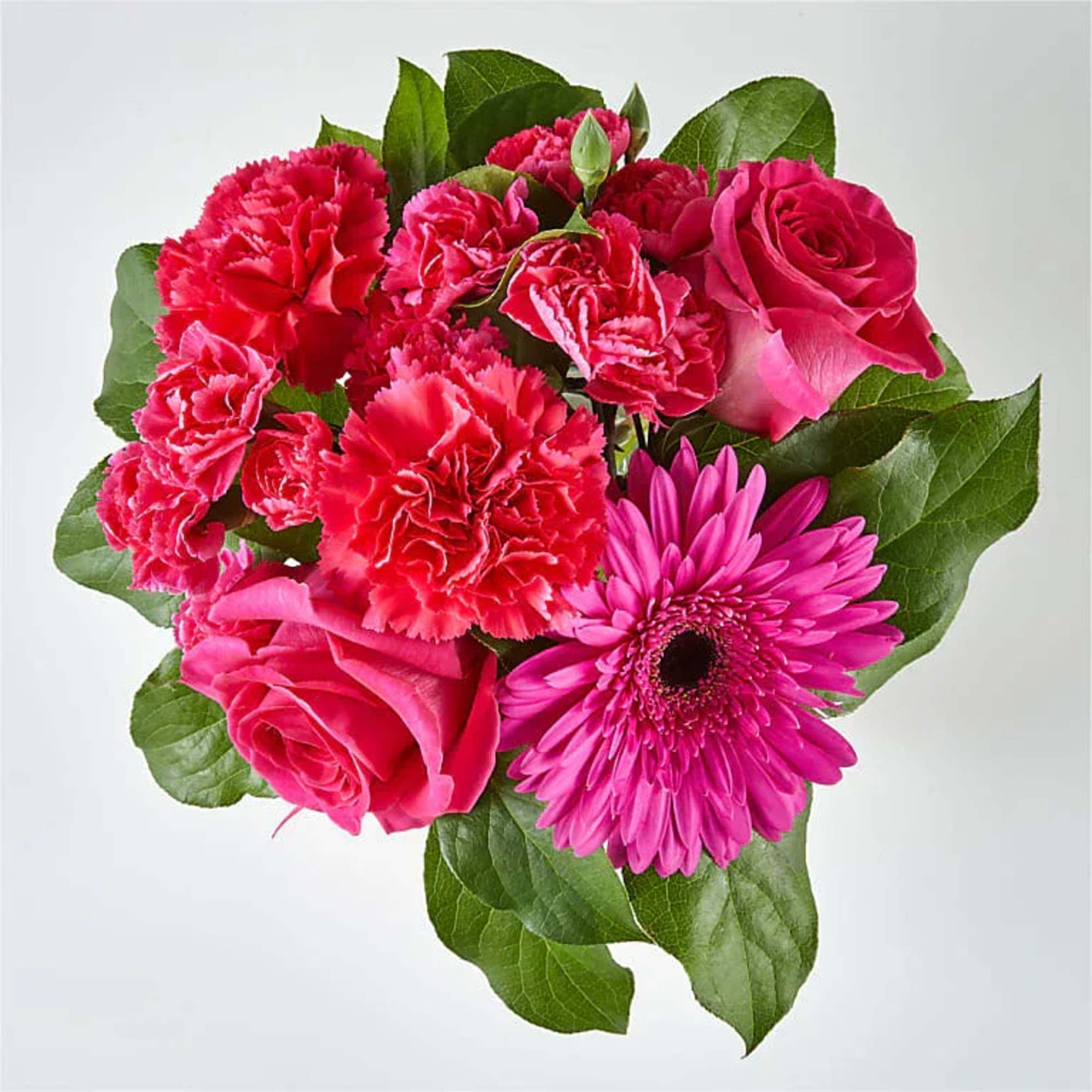 Pink roses, carnations, and a gerbera daisy bouquet