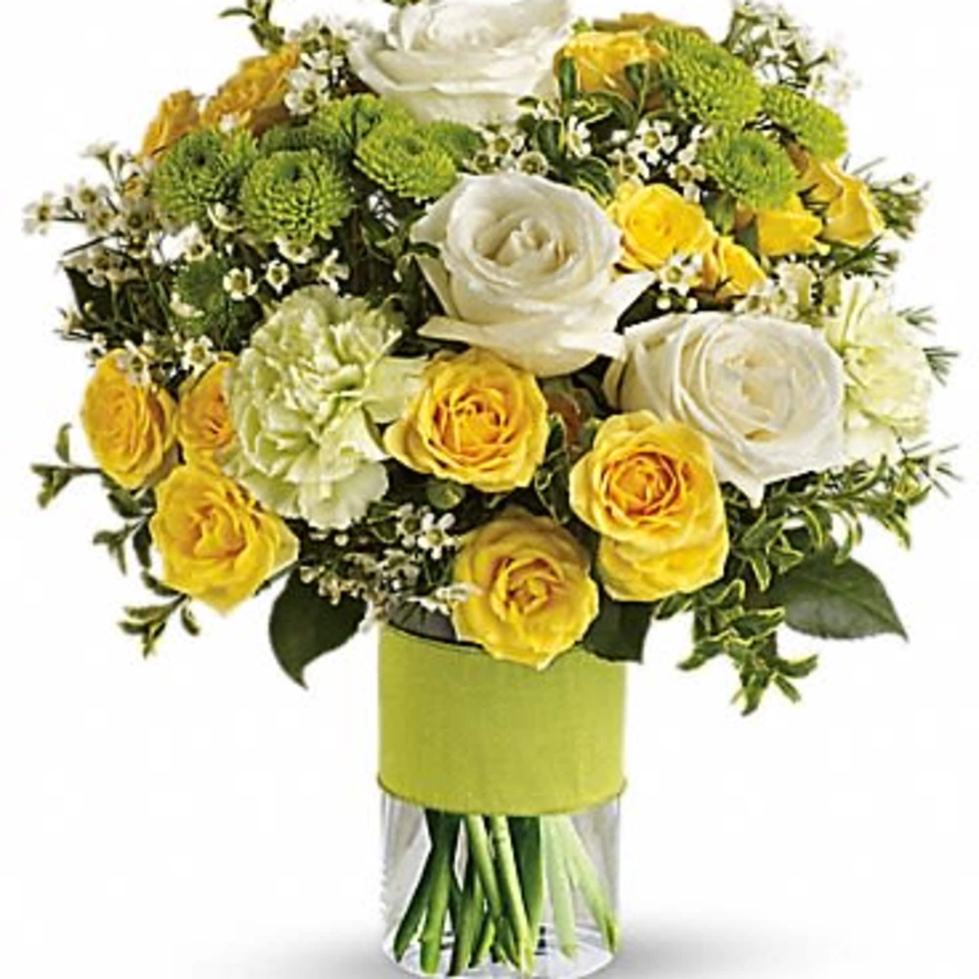 Bouquet of yellow and white roses in a clear glass vase