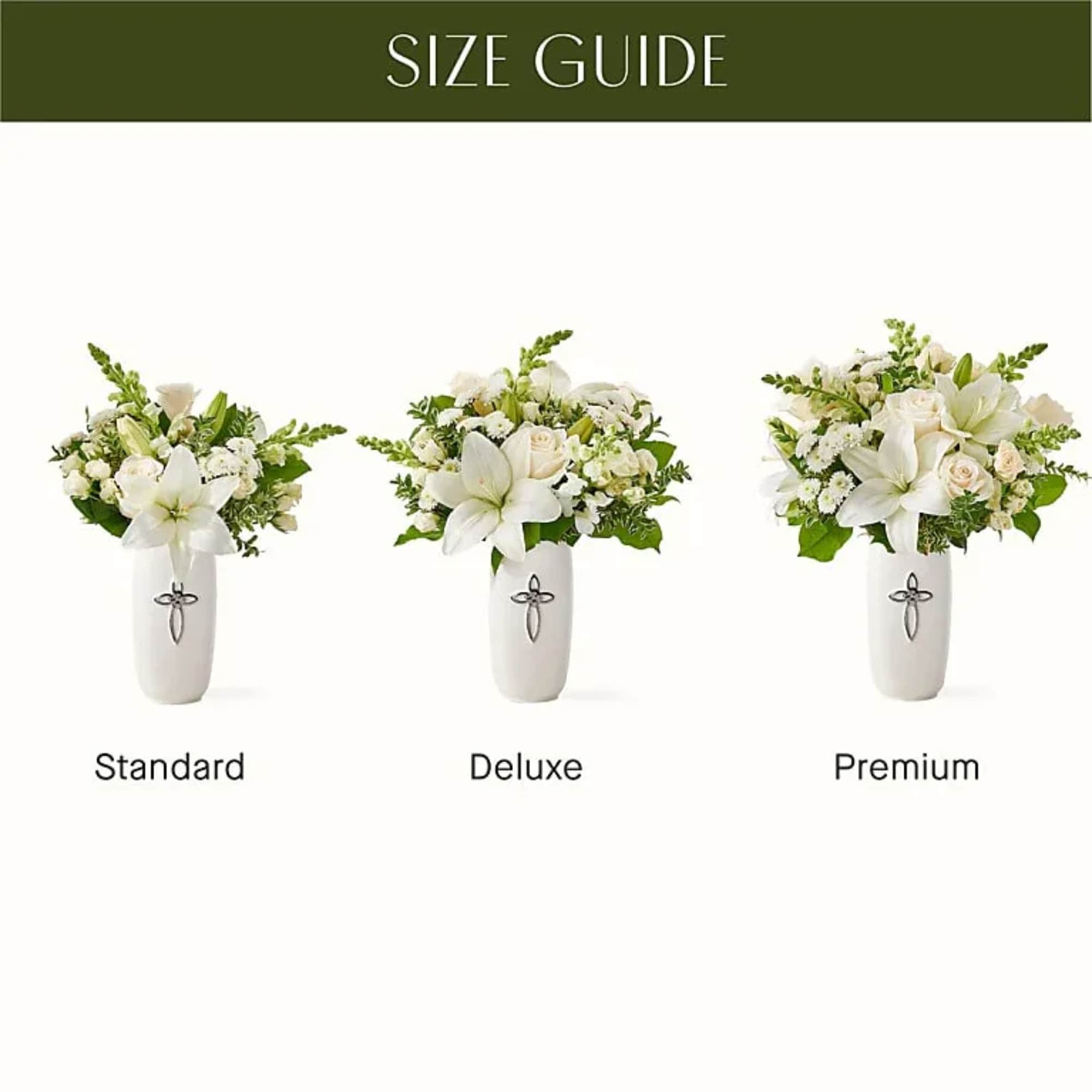 Three white floral arrangements in white vases labeled standard, deluxe, and premium