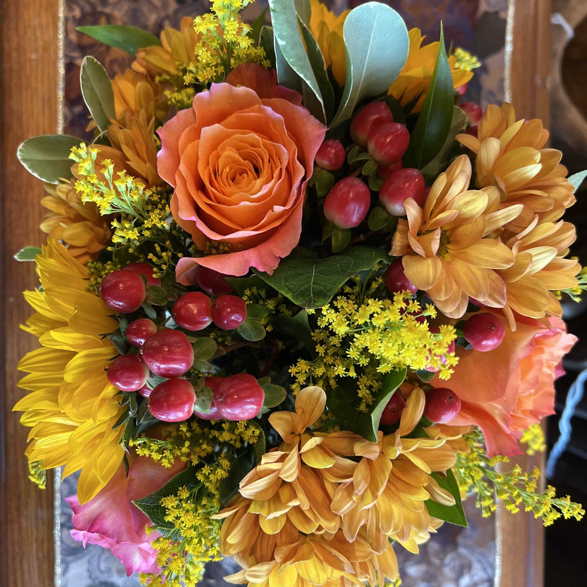 Sunflowers, orange roses, solid aster, red hypericum berries, daisy poms, thoughtfully arranged, photo 2 of 2