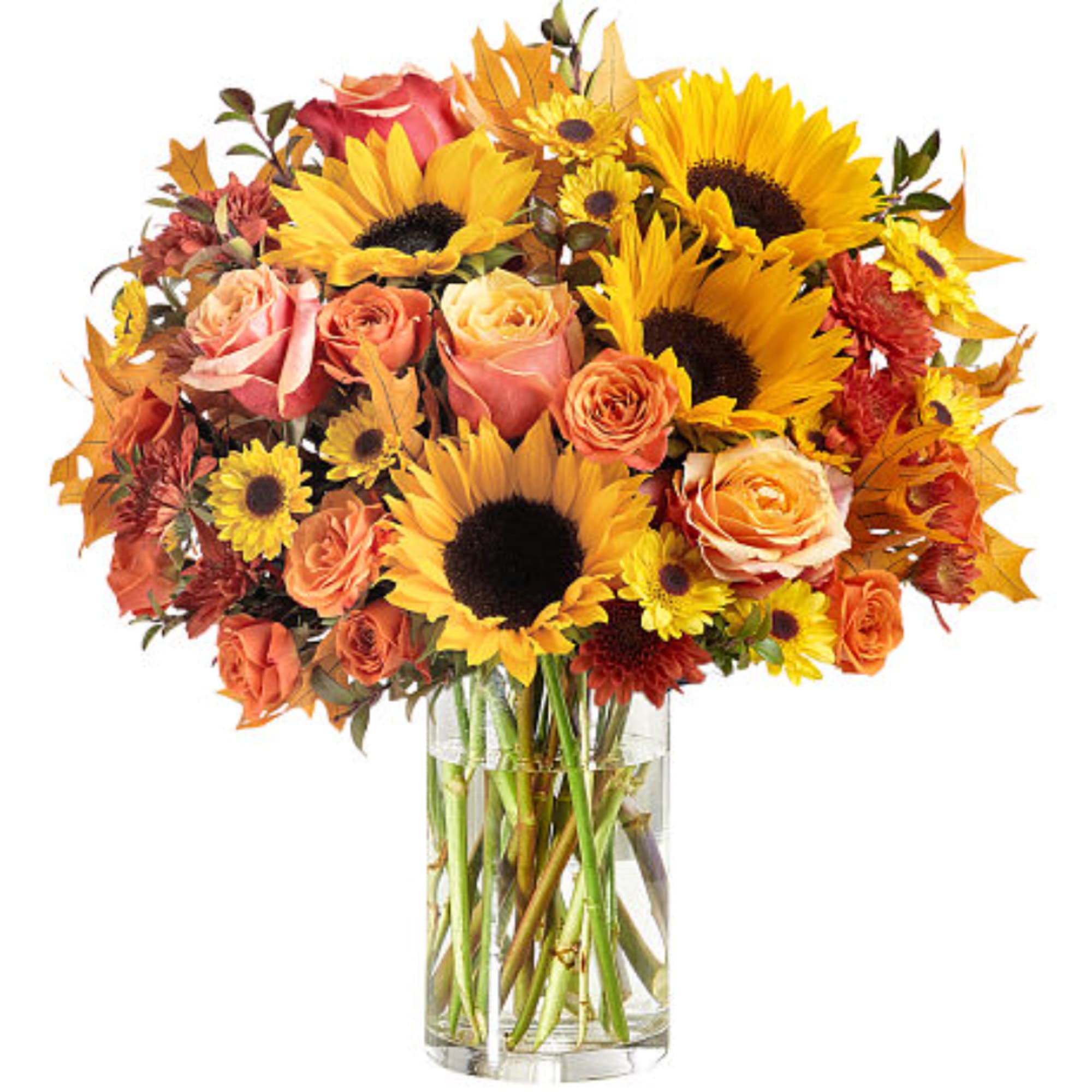Bouquet of sunflowers and roses in a clear glass vase