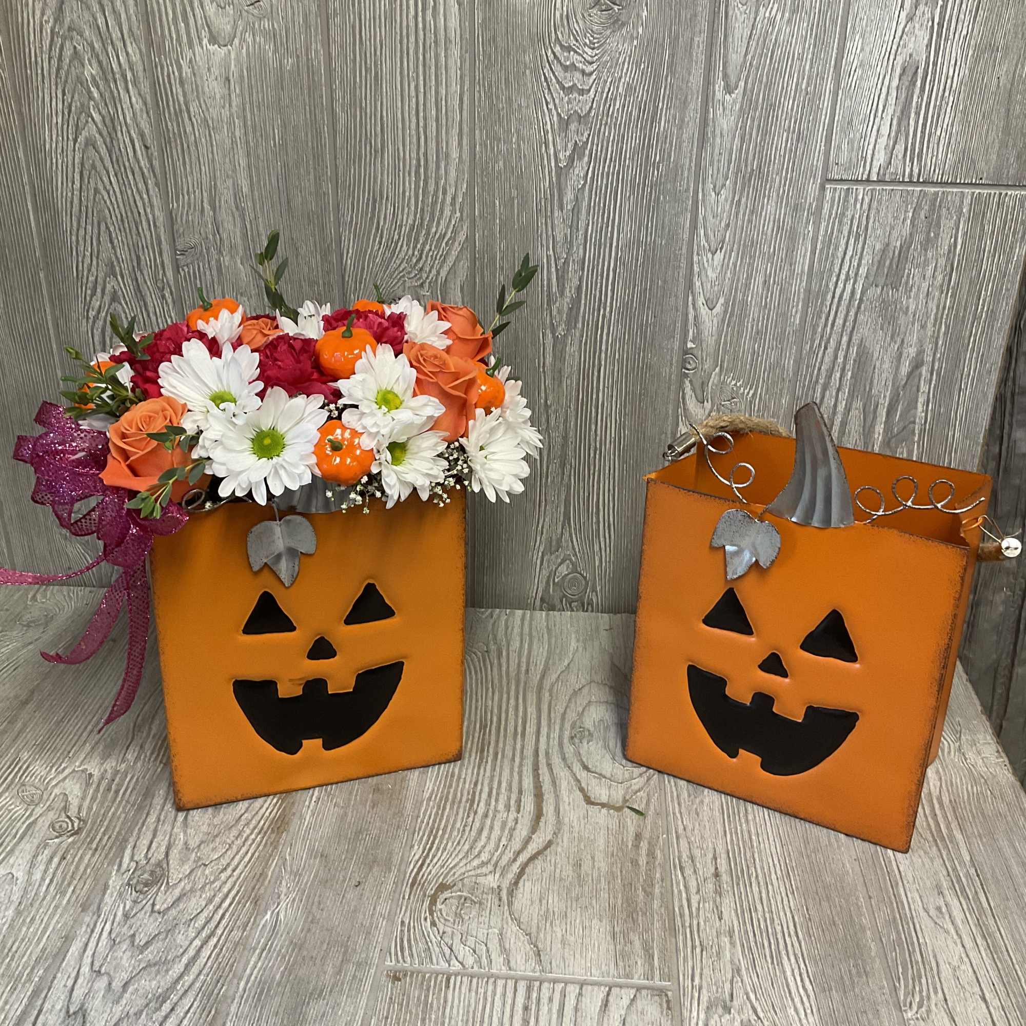 Fresh cut flowers arranged in a metal jack-o-lantern candy bag! Colors and, photo 2 of 3