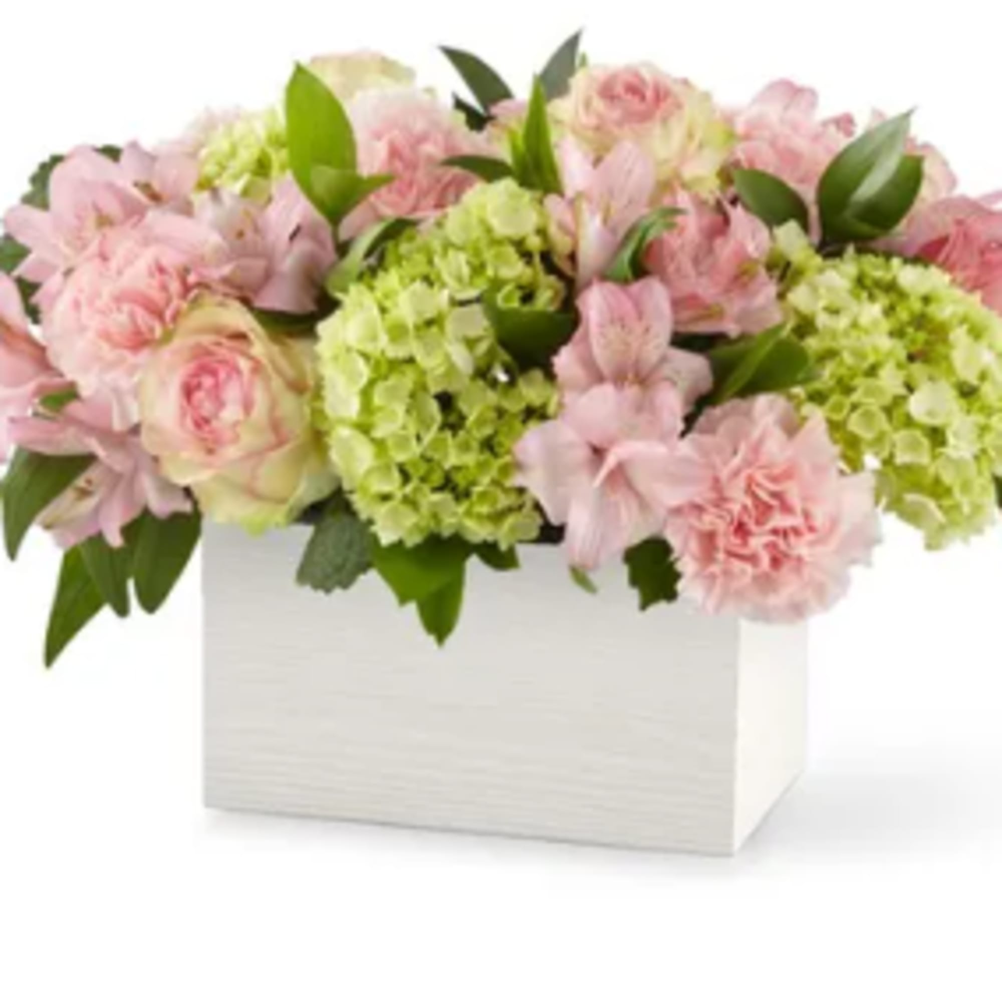 Pink flowers and green hydrangeas in a white box