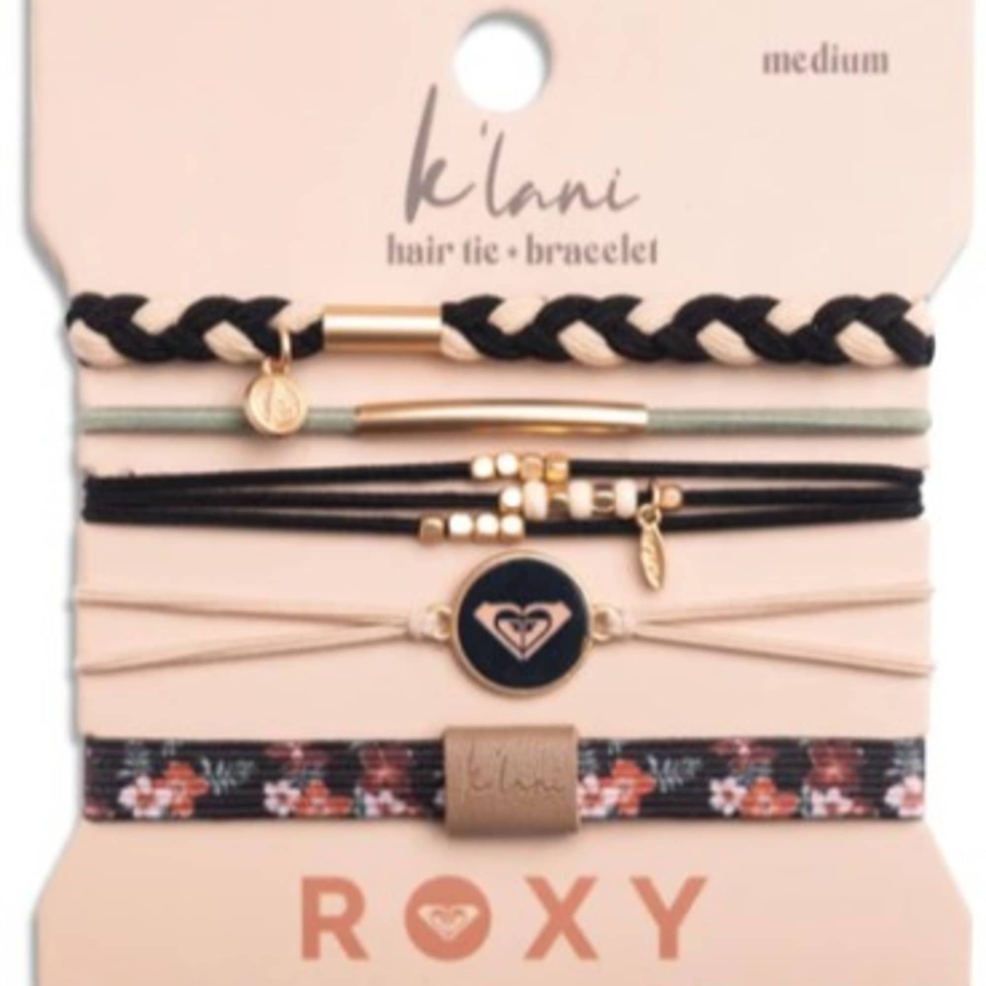 Carded set of braided and elastic bracelets in pink packaging