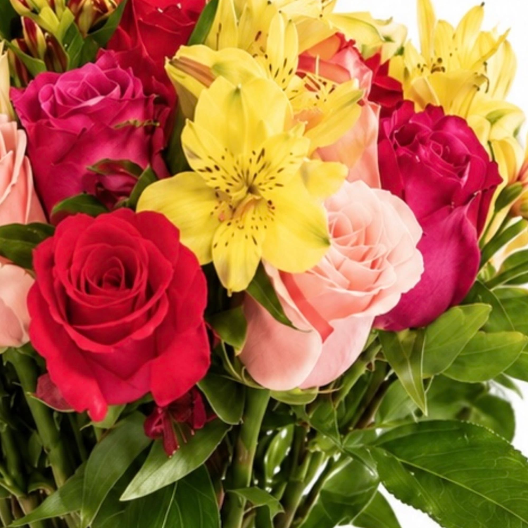 Bouquet of red, pink, and yellow flowers with green foliage