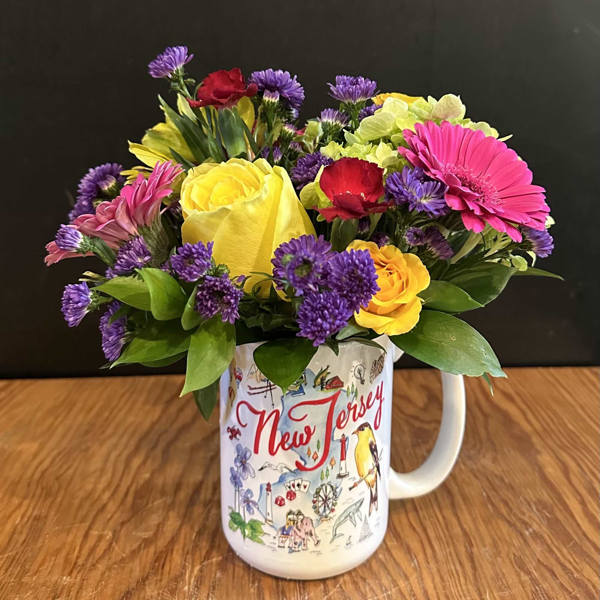 Celebrate local charm with this beautifully designed New Jersey-themed ceramic mug, filled