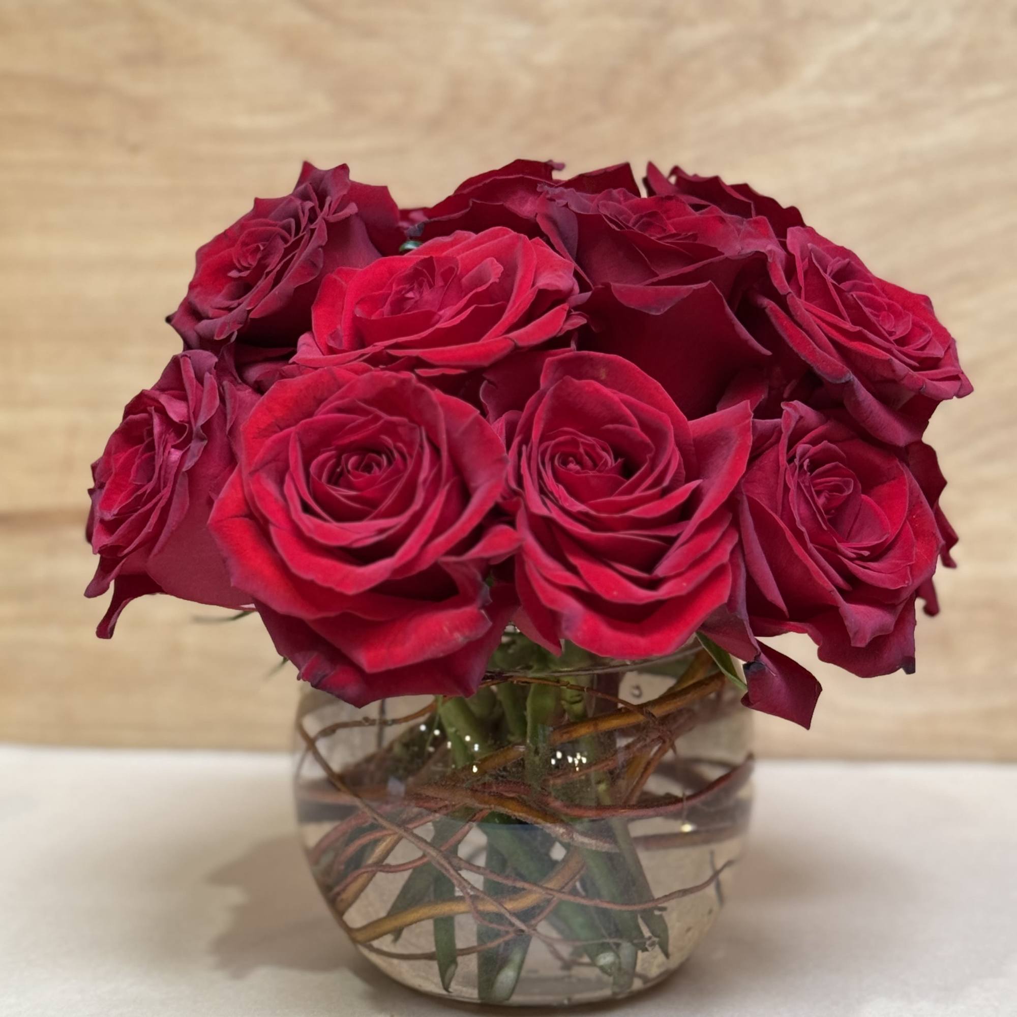 15 red roses exquisitely arranged in a 6" bubble bowl..
Height: Approximately 10", photo 3 of 3