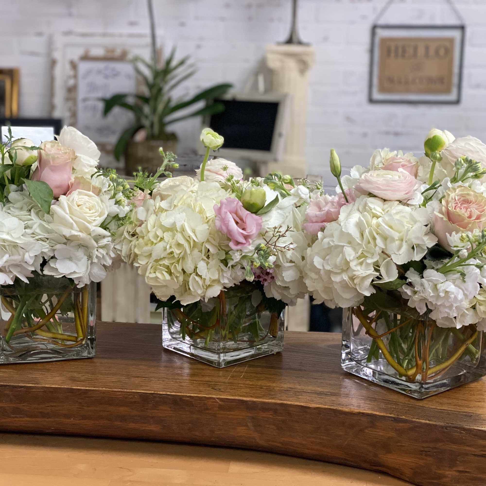 Gorgeous light &amp; Delicate flowers in an elegant glass cube