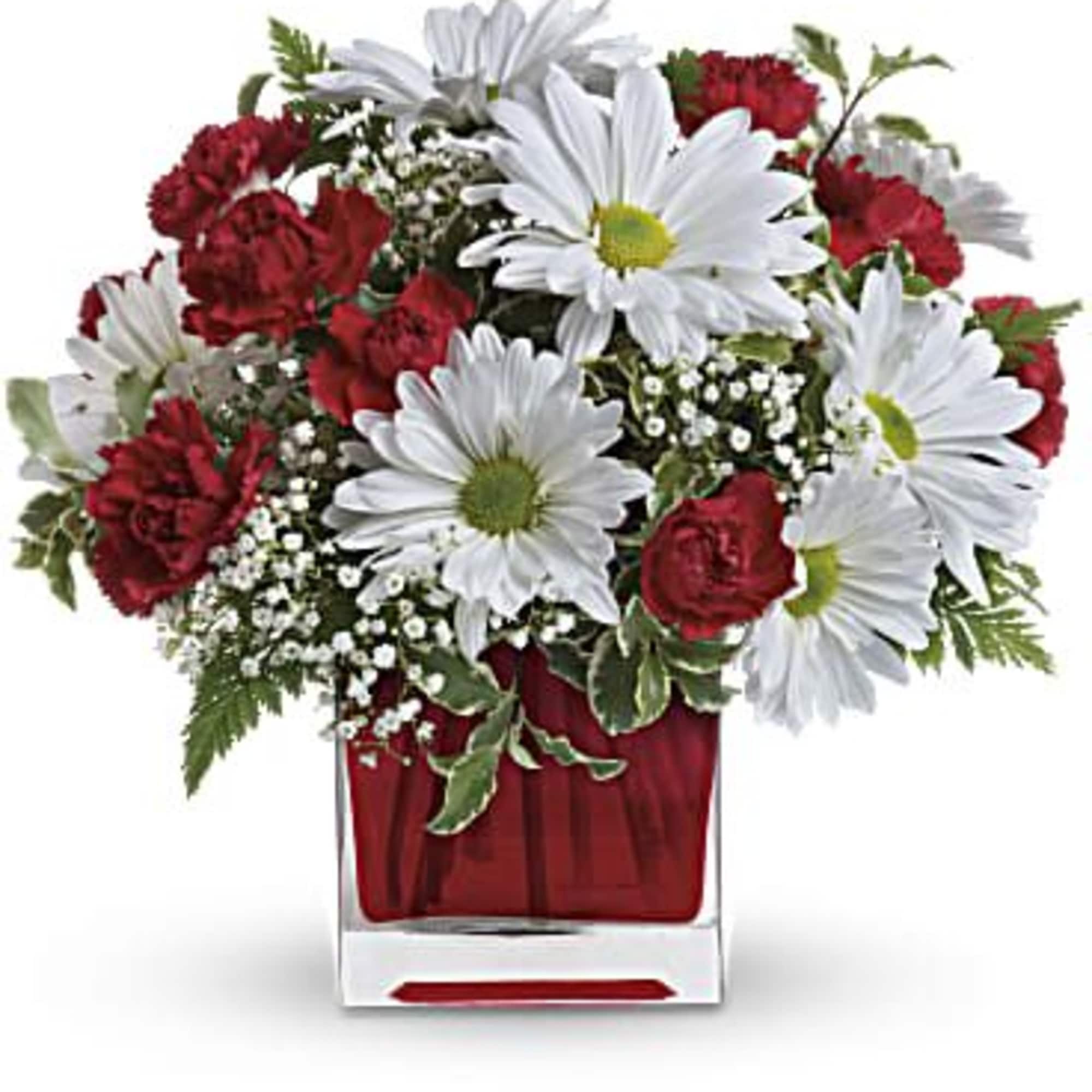 This simply sweet bouquet is delicately arranged in our ruby red glass