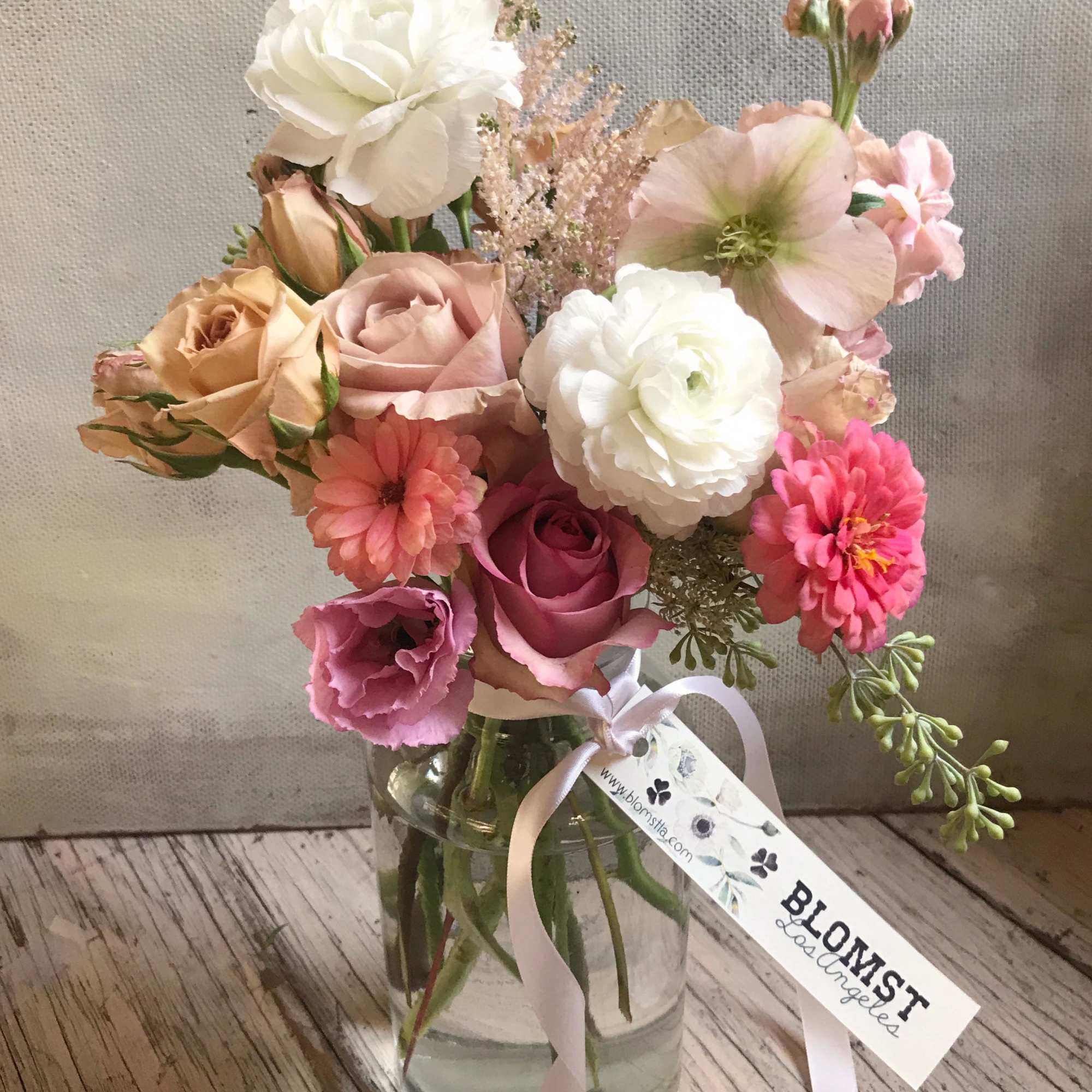 A smaller, yet super pretty arrangement placed in a smaller jar/vase (4, photo 2 of 4
