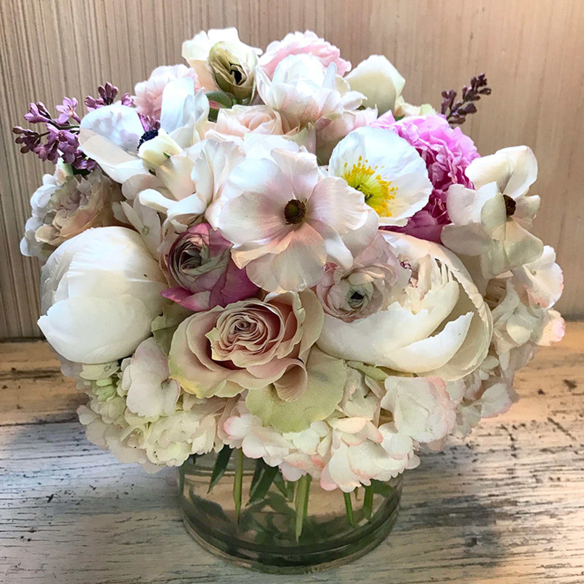 Get a beautiful, fresh medium sized Blomst arrangement of seasonal pastels or, photo 8 of 10
