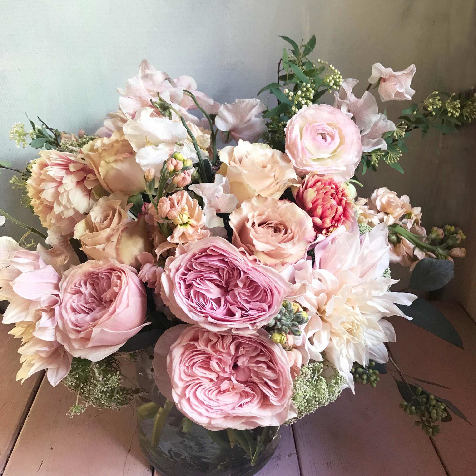 Blush and cream bouquet in a glass vase