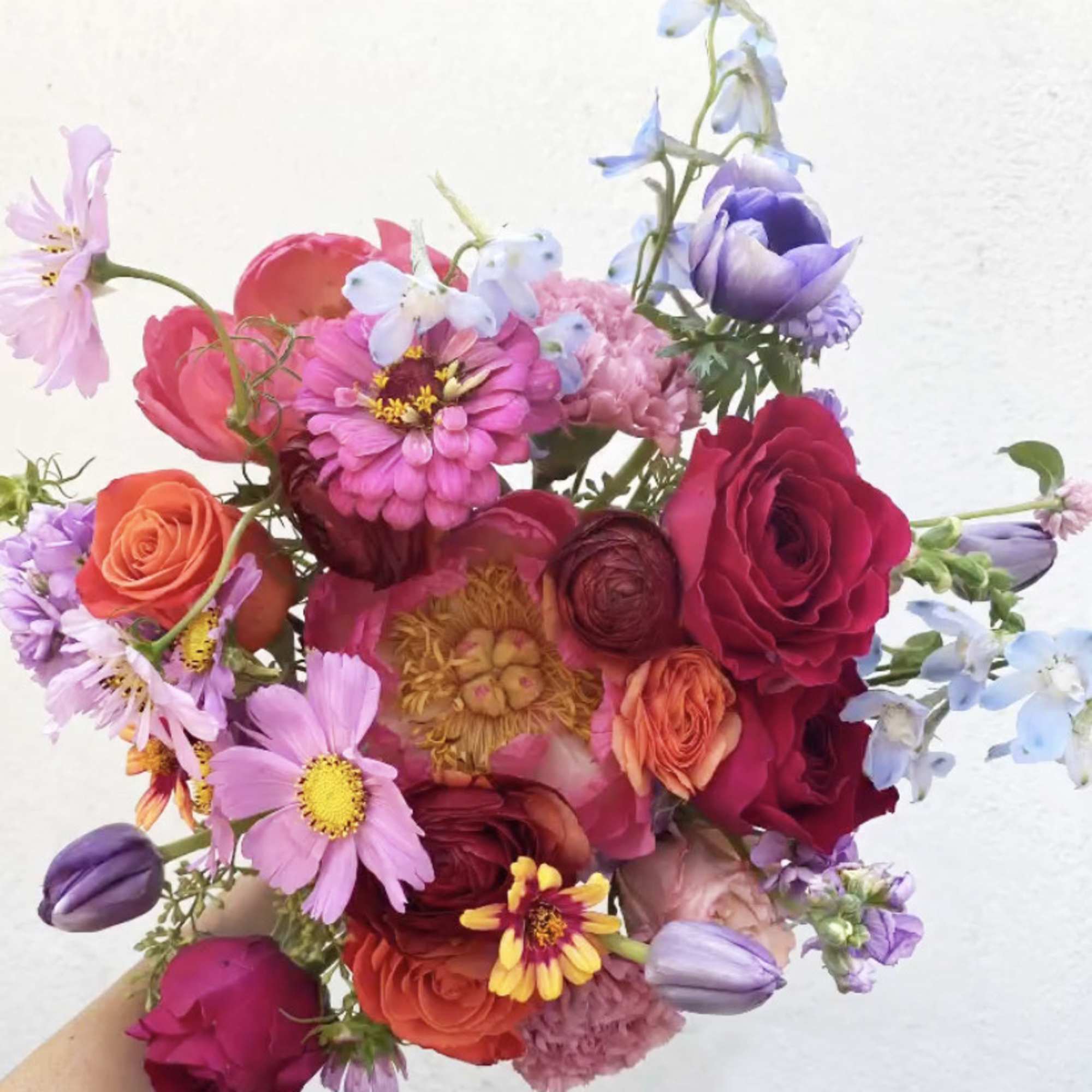 Hand tied pretty bouquet of happy bright colors.
Ranunculus, roses, snapdragons and other, photo 4 of 4