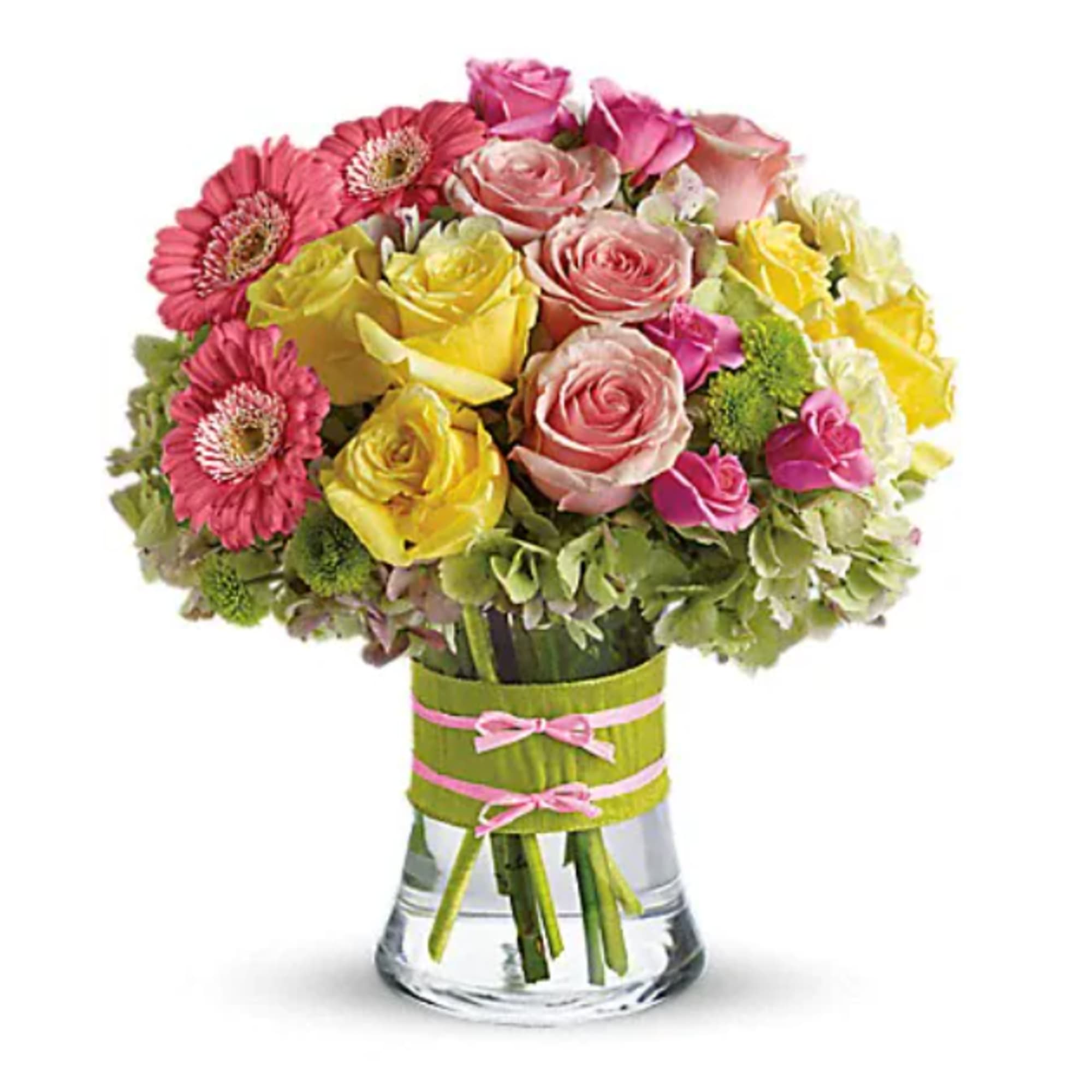 Mixed pink and yellow roses in a clear glass vase