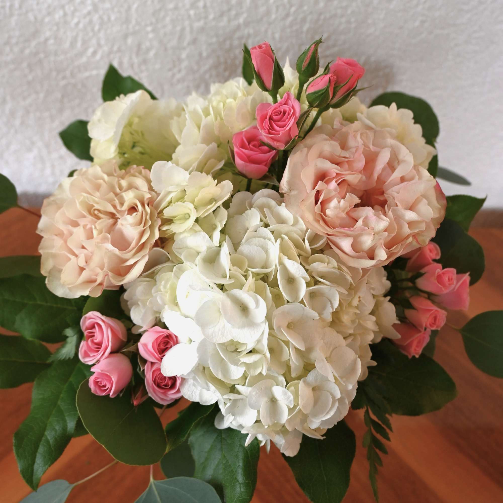 This comforting combination of pink roses and white hydrangea exudes warmth and, photo 2 of 2