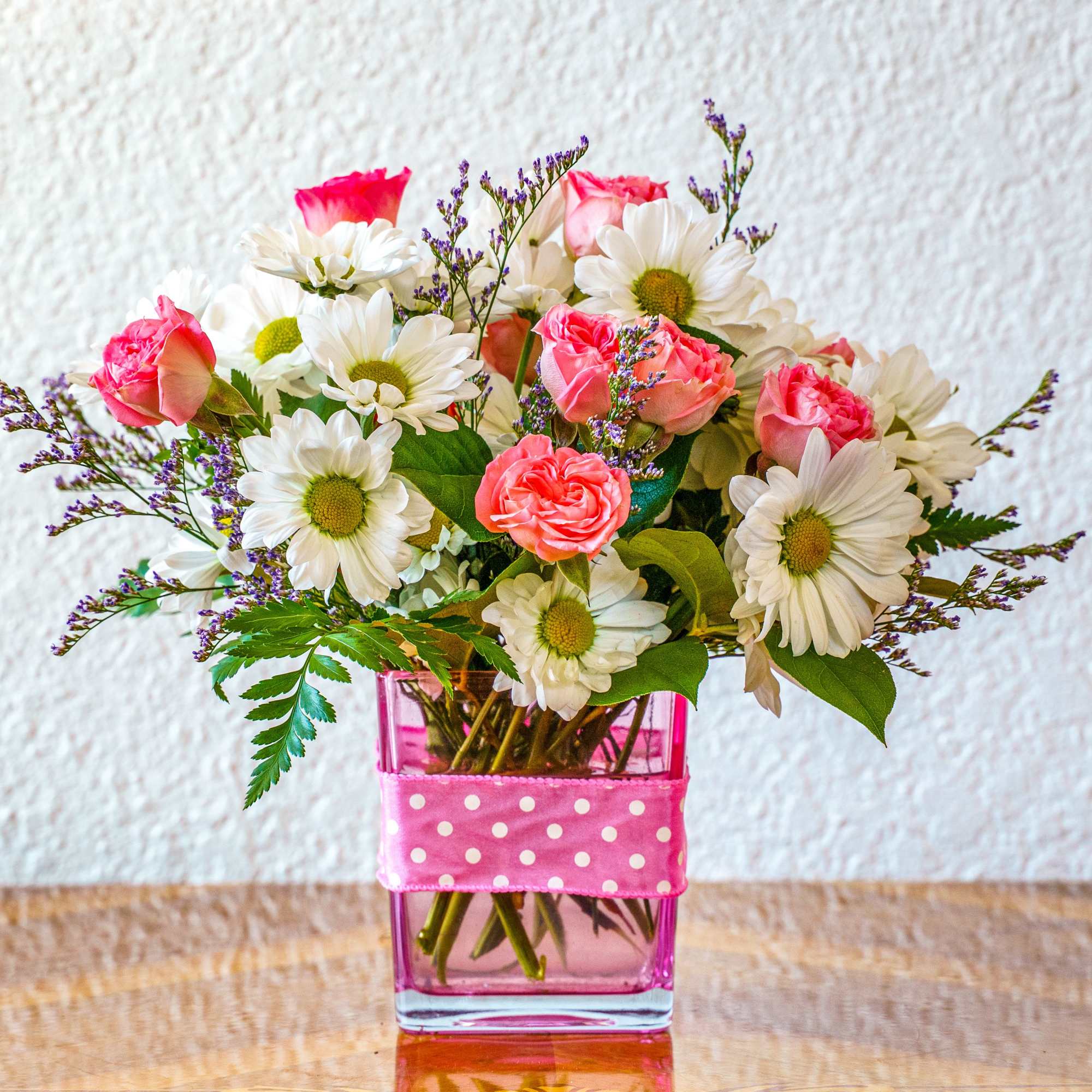 Dazzle the little doll in your world! This pretty little arrangement is