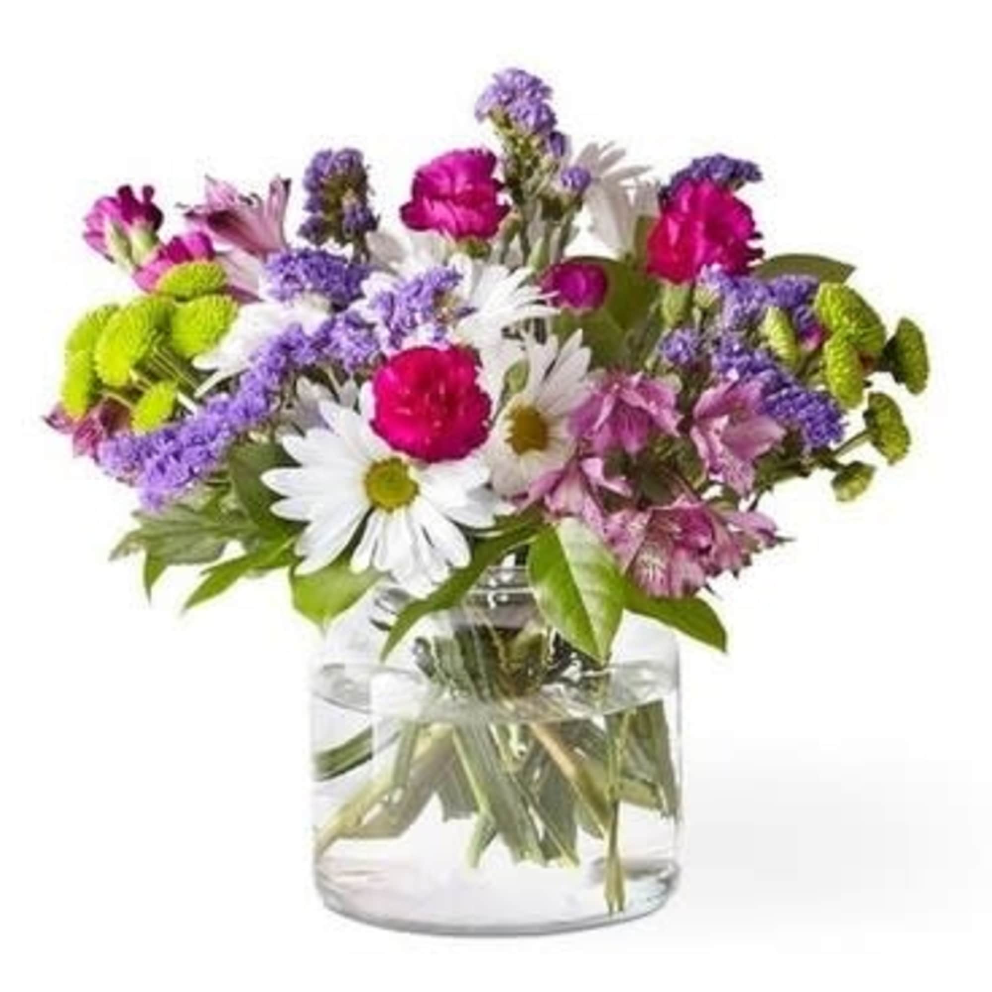 Mixed bouquet of daisies, carnations, and purple filler flowers in a glass vase
