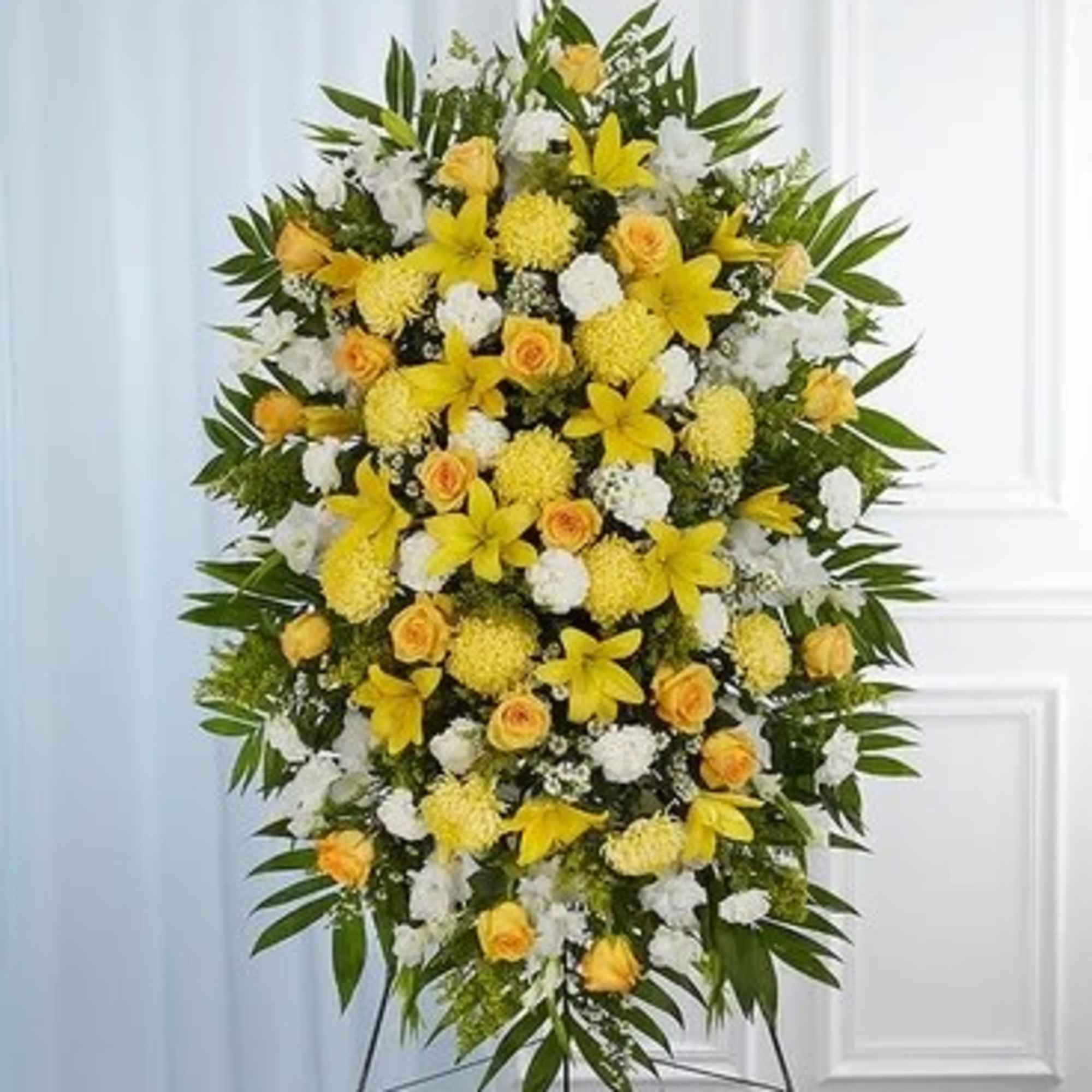Standing floral spray with yellow and white flowers on an easel, photo 3 of 3