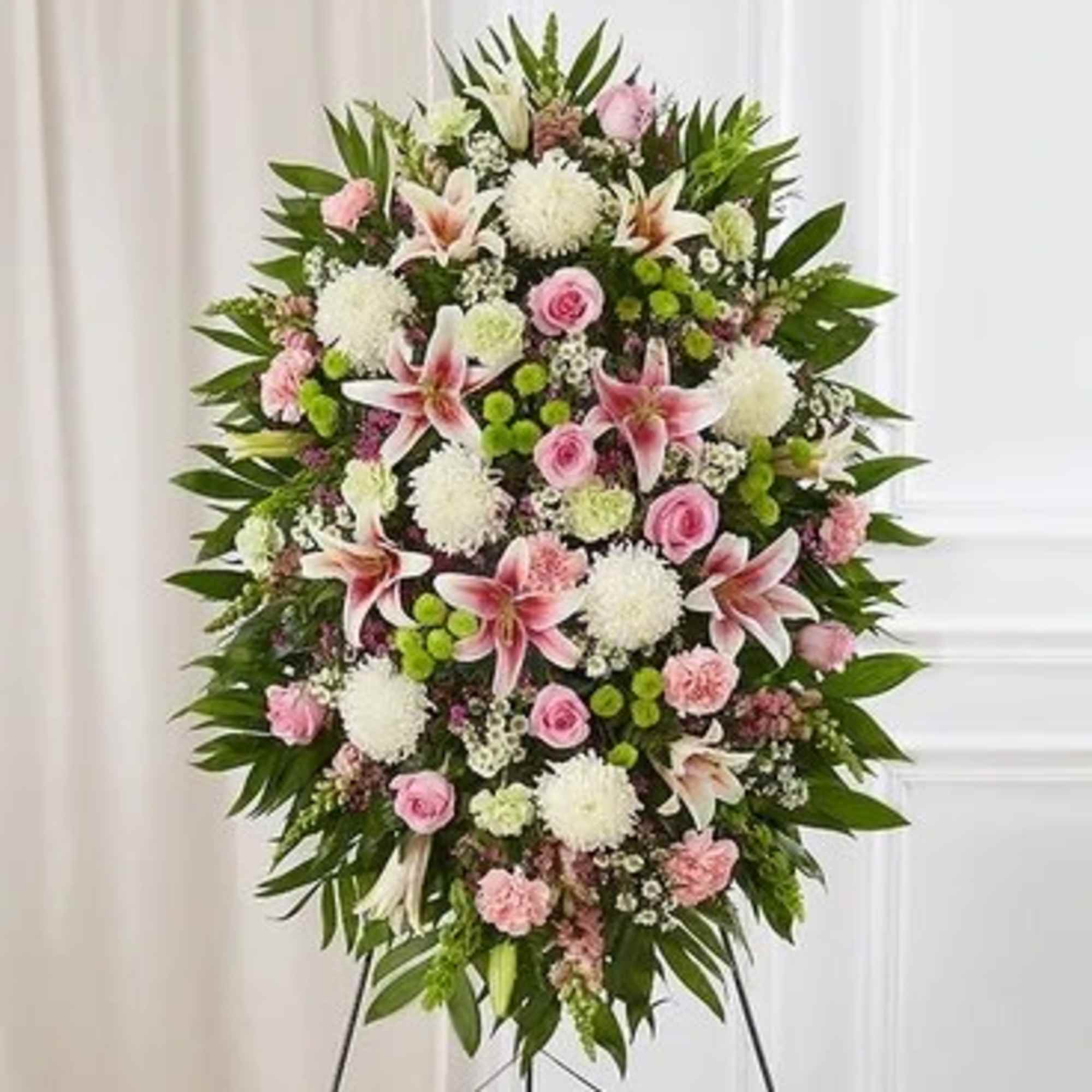 Standing floral spray with pink and white flowers on an easel, photo 2 of 3