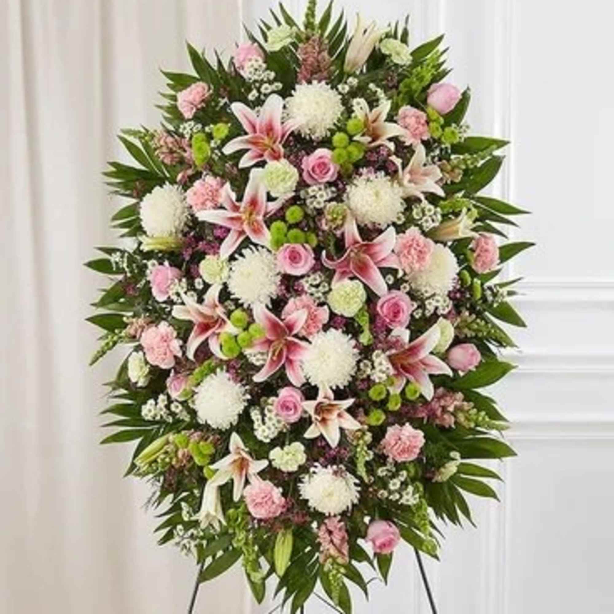 Standing floral spray with pink and white flowers on an easel, photo 3 of 3