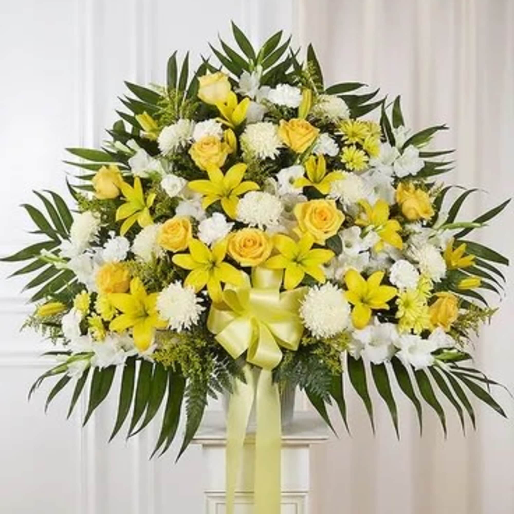 Yellow and white floral standing spray with a ribbon bow, photo 3 of 3