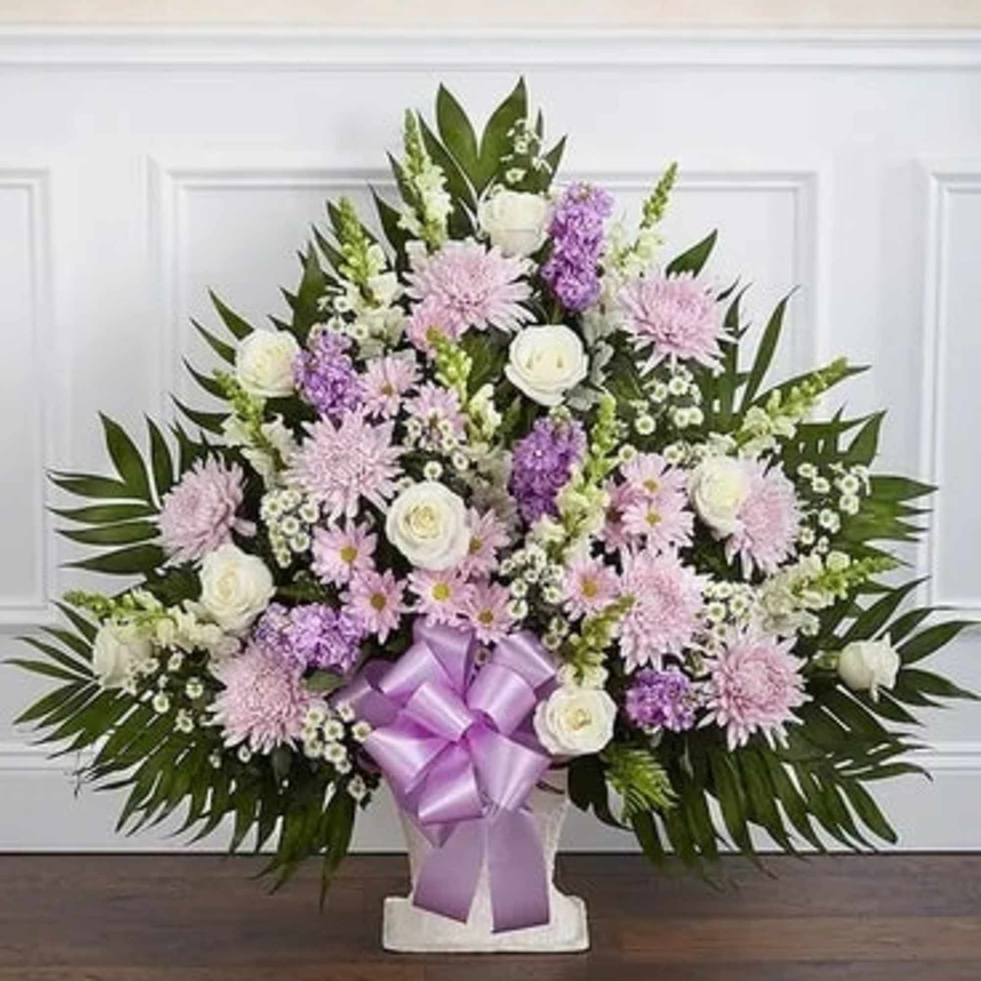 Lavender and white floral spray with a purple ribbon on a stand, photo 3 of 3