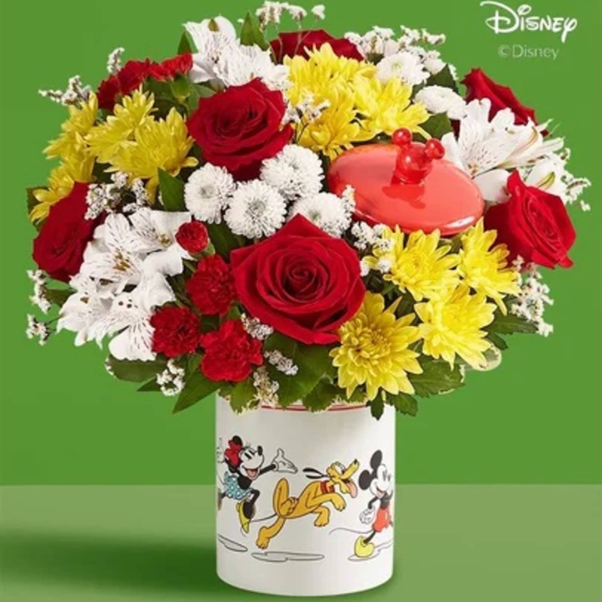 Bouquet of red roses, yellow and white daisies in a Mickey Mouse container