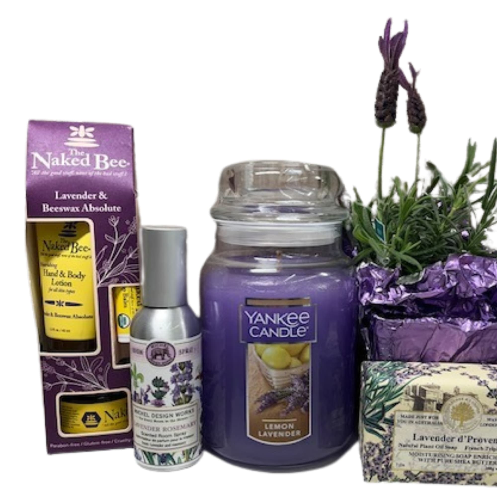Lavender-themed gift set with candle, lotion, spray, soap, and potted lavender