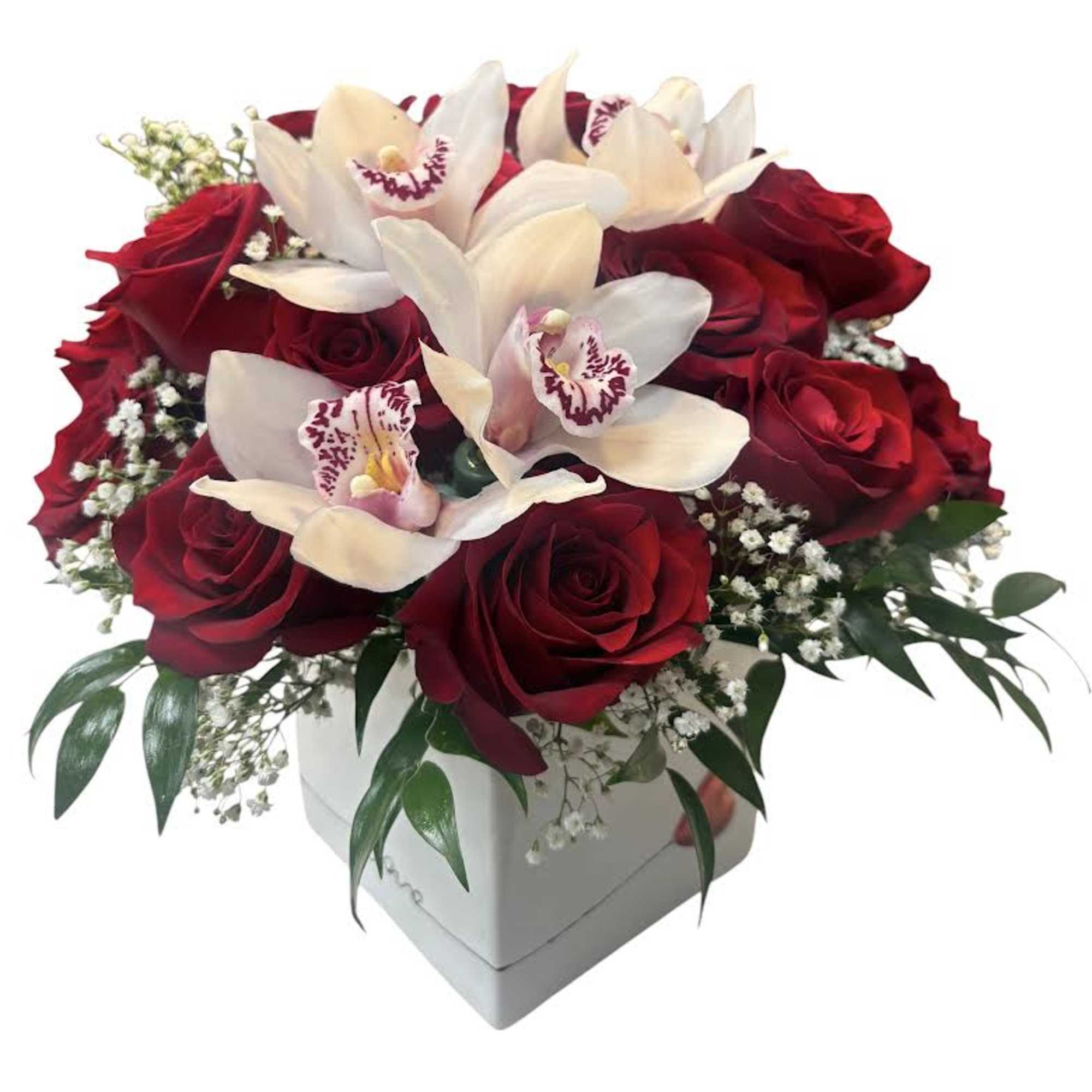 Premium deep red roses paired with creamy white orchids come together in, photo 2 of 2