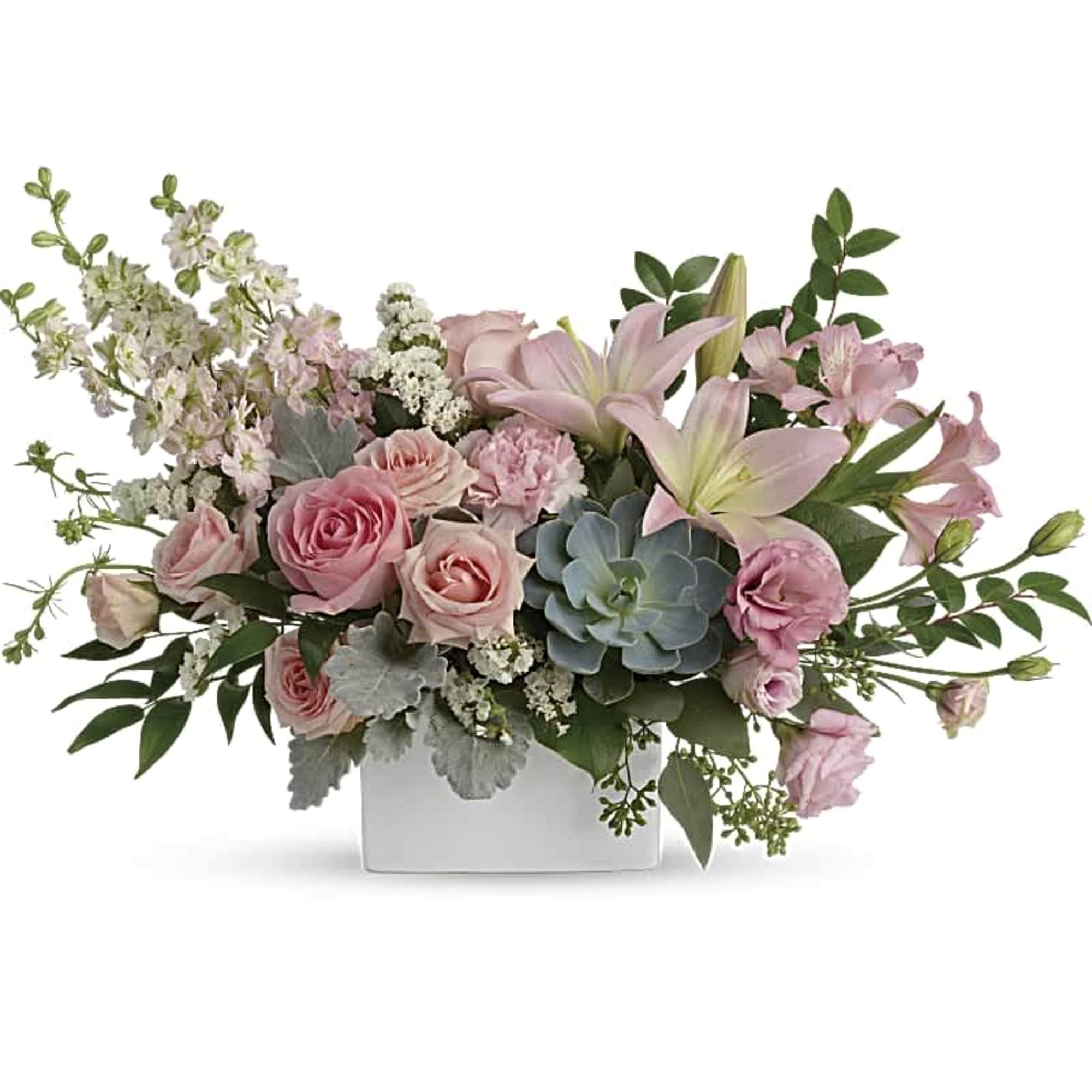 Pink roses and lilies in a white rectangular vase