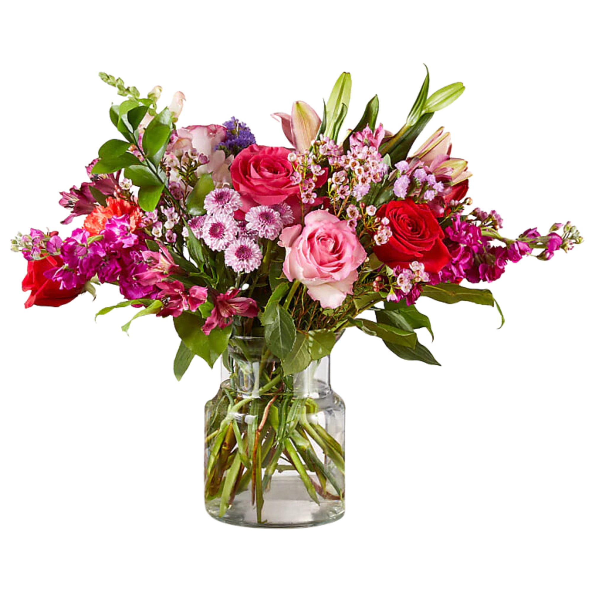 Mixed bouquet of pink and red roses in a clear glass vase