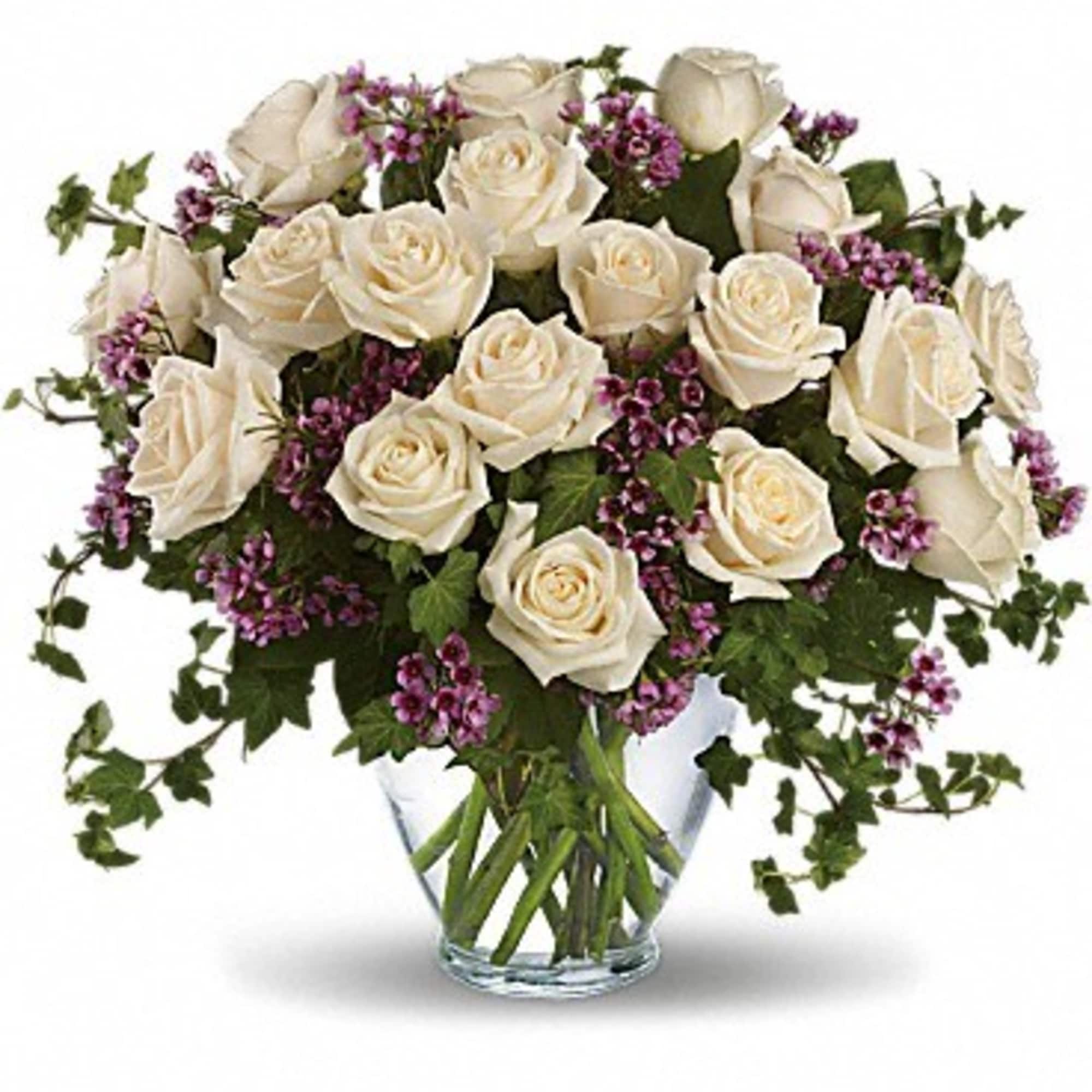 Romance blossoms beautifully within this elegant bouquet. The serenity and innocence of