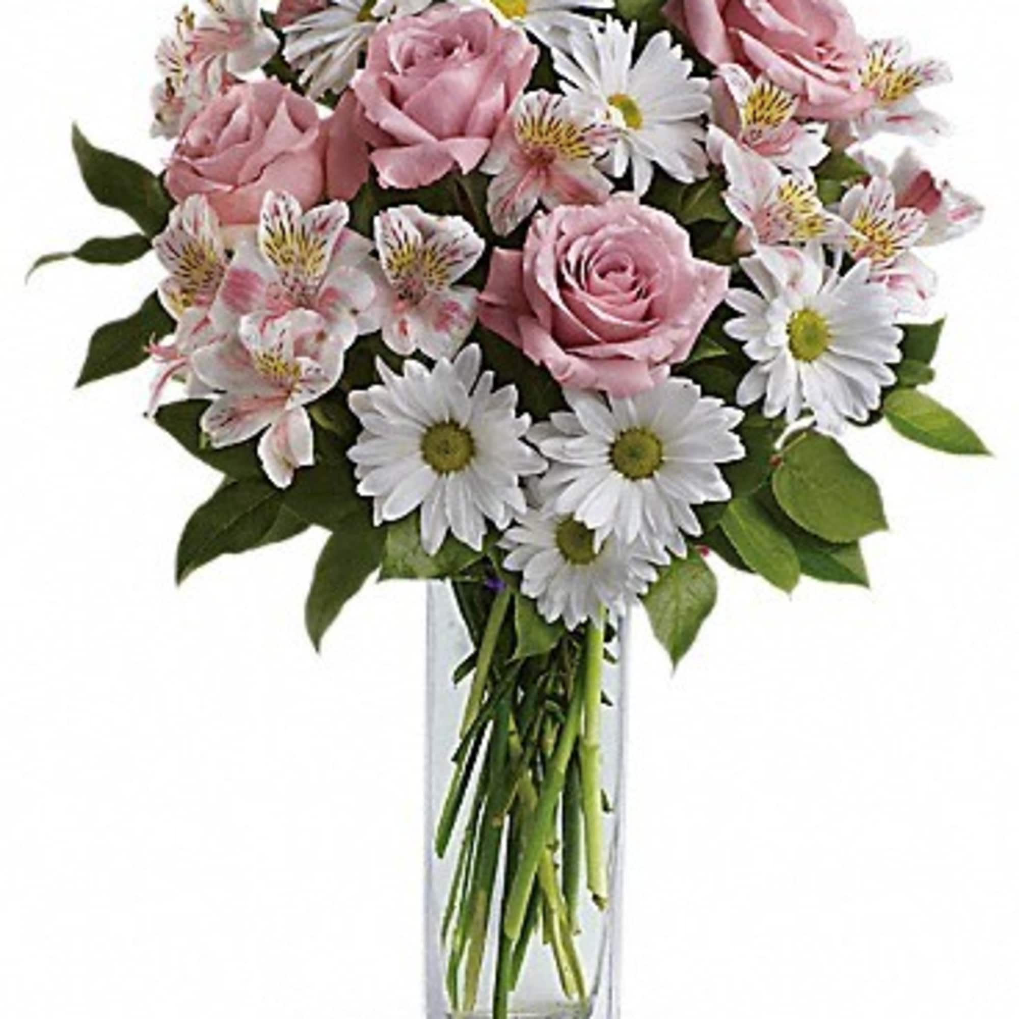 Soft and delicate, this pale pink and white bouquet speaks to the