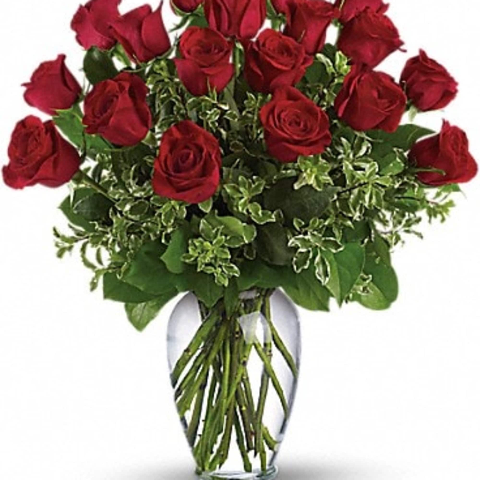 Bouquet of red roses in a clear glass vase