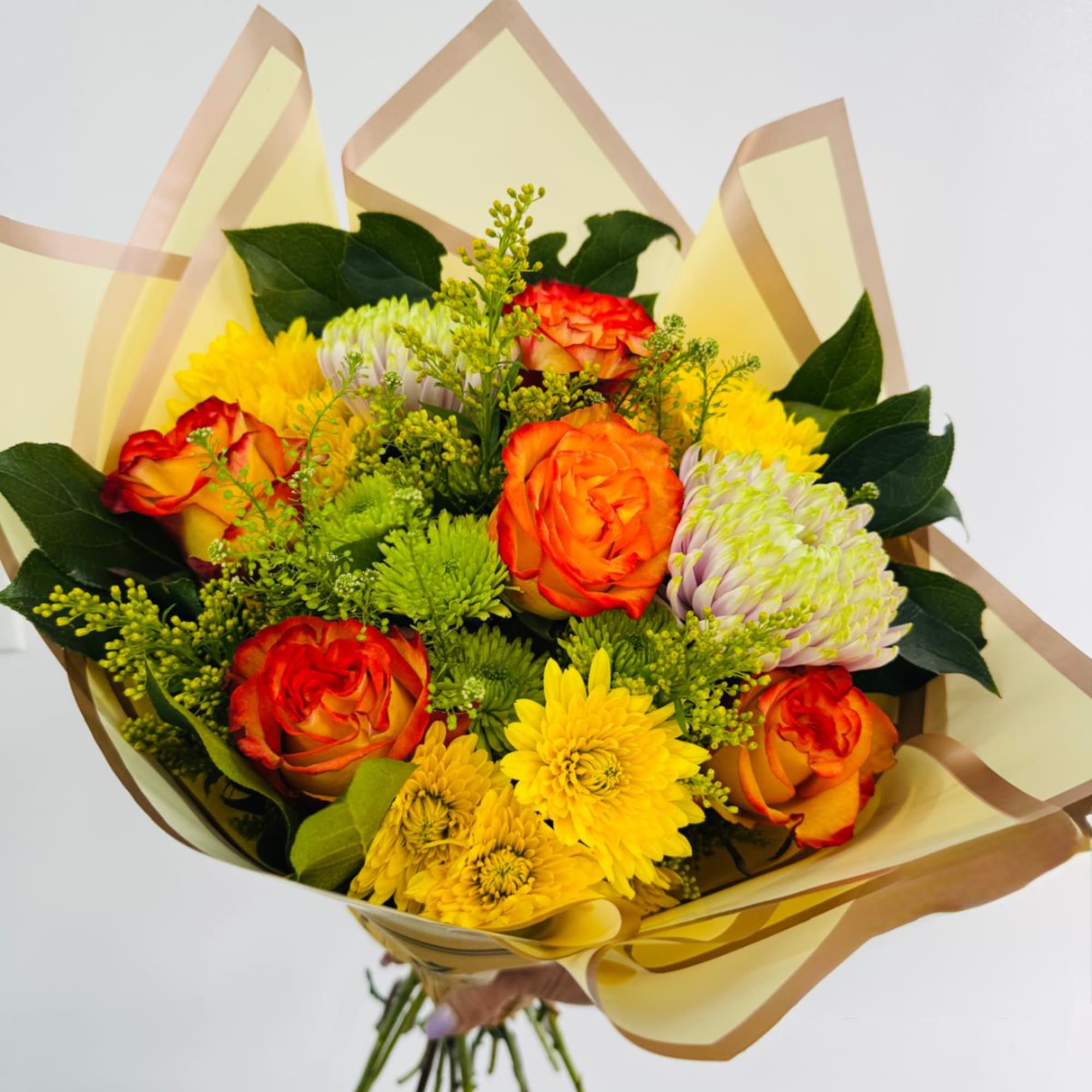 Bouquet of orange roses and yellow chrysanthemums wrapped in pale paper, photo 4 of 4