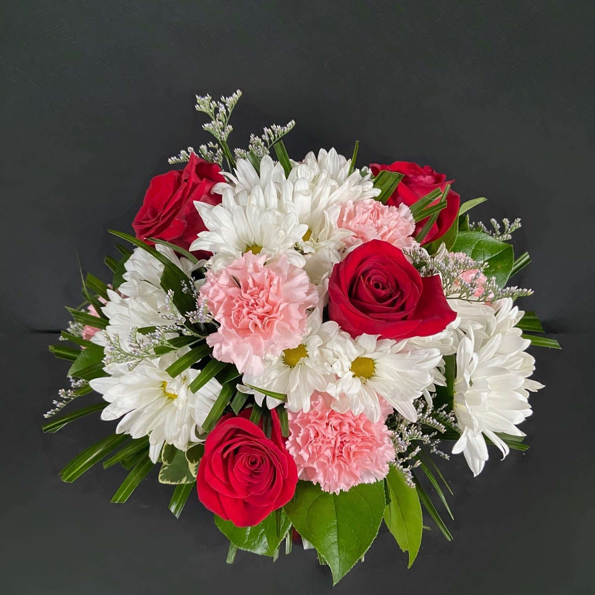 This bouquet is a sweet way to show someone you care. Boldly, photo 2 of 3
