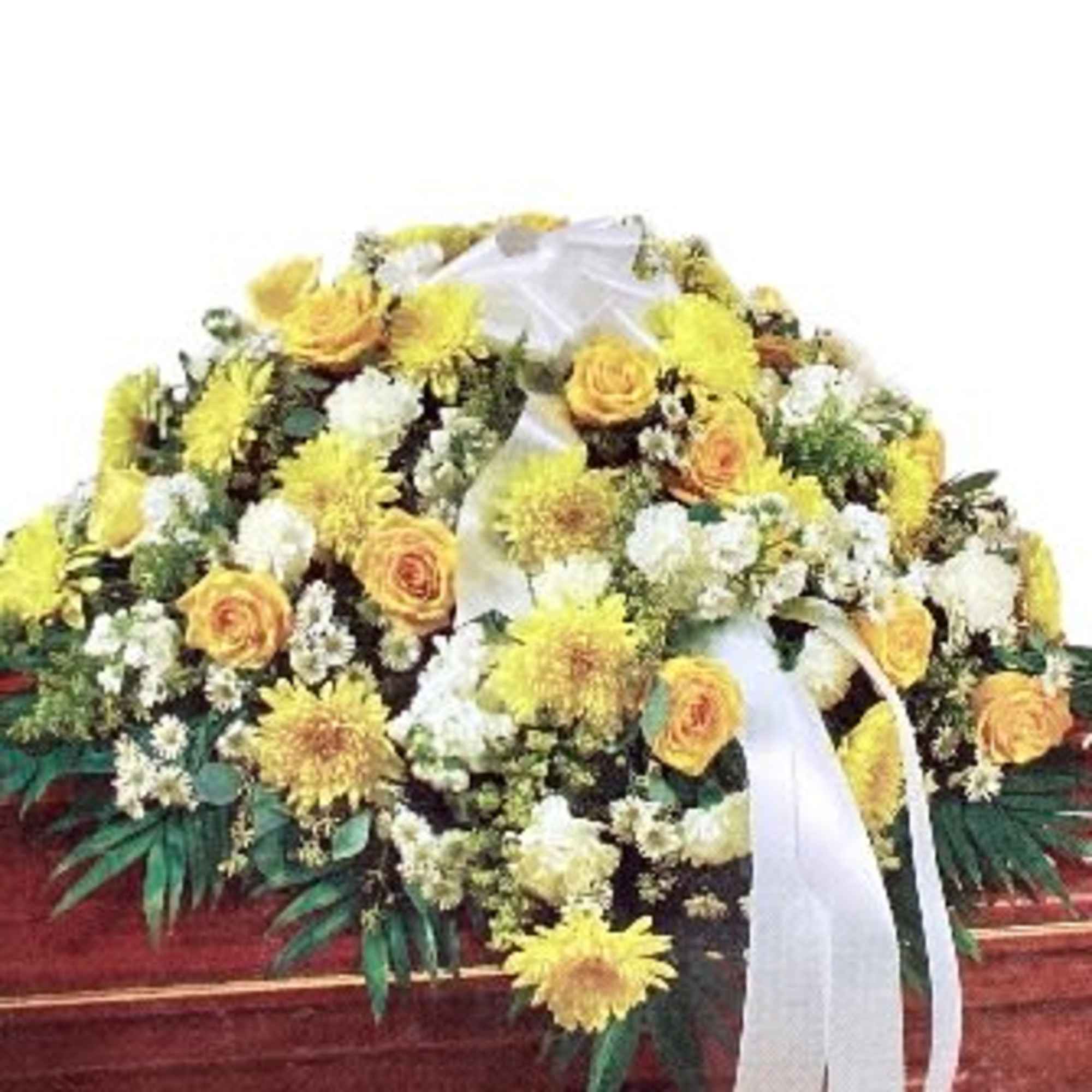 Yellow and white floral casket spray with ribbon